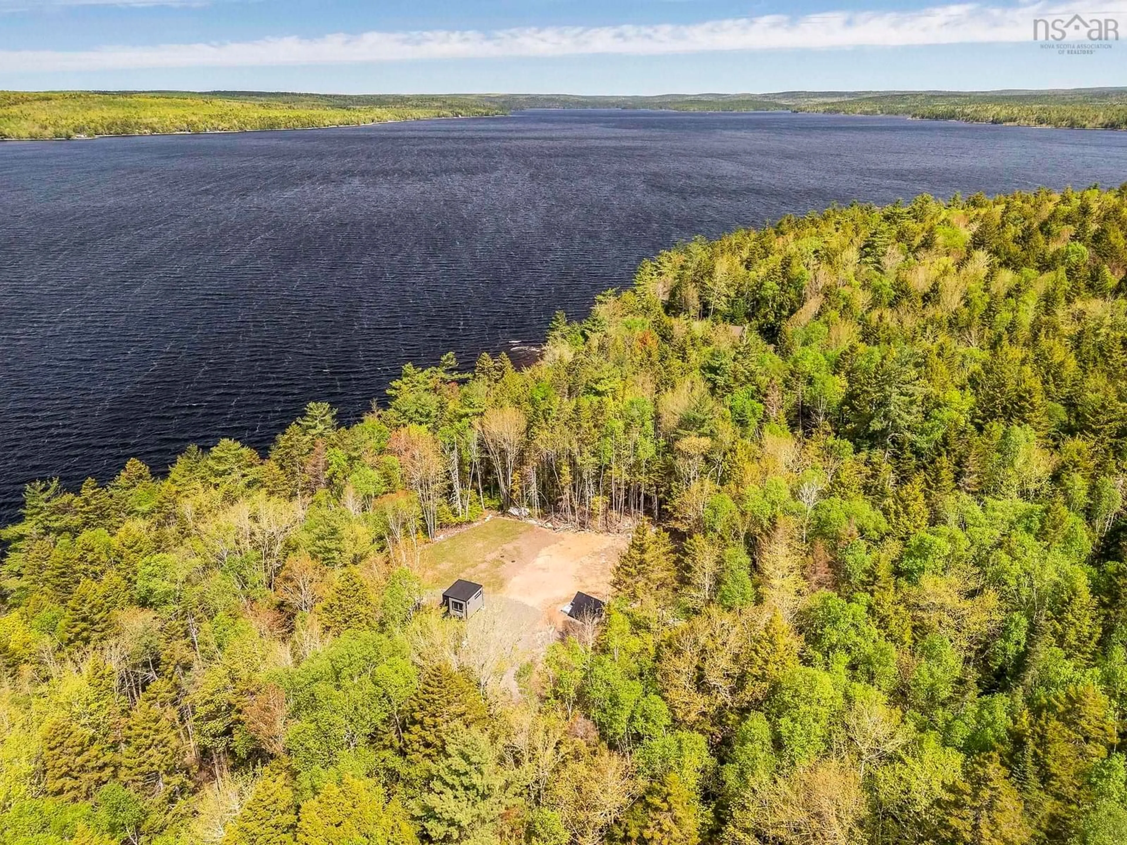 A pic from outside/outdoor area/front of a property/back of a property/a pic from drone, water/lake/river/ocean view for 170 South Point Rd, Forties Nova Scotia B0J 2M0
