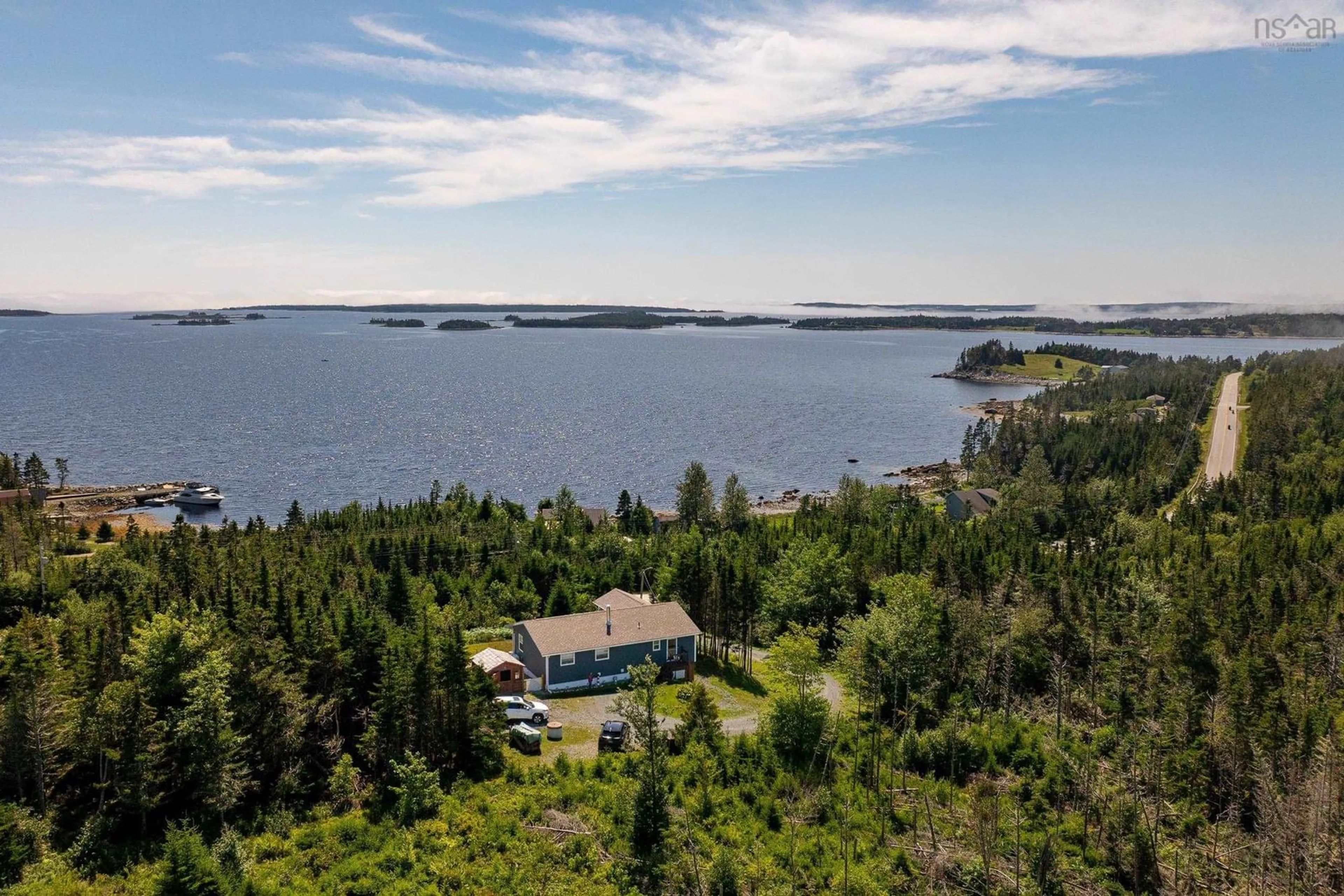 A pic from outside/outdoor area/front of a property/back of a property/a pic from drone, water/lake/river/ocean view for 16335 Highway 7, Pleasant Harbour Nova Scotia B0J 3H0