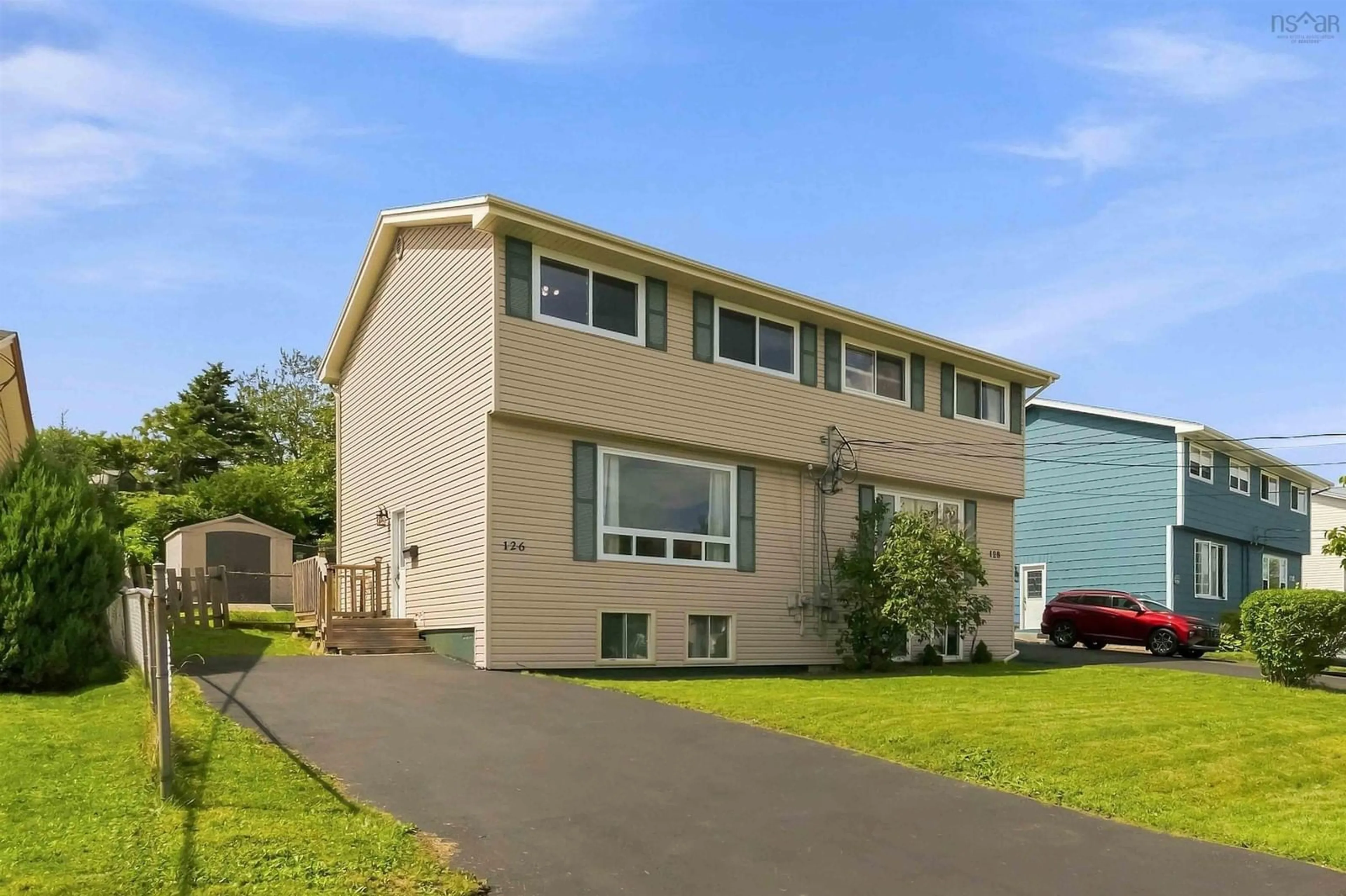 Home with vinyl exterior material, street for 126 Poplar Dr, Cole Harbour Nova Scotia B2W 2K6