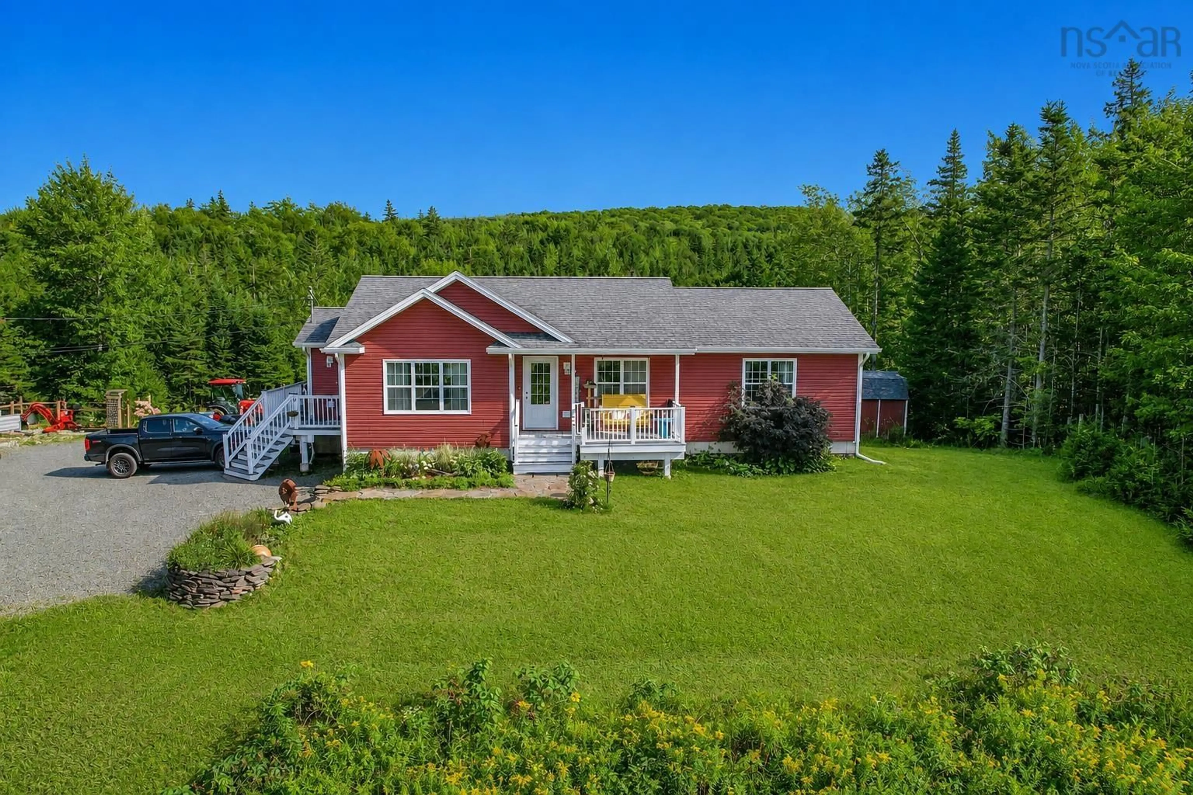 A pic from outside/outdoor area/front of a property/back of a property/a pic from drone, unknown for 3975 East Bay Hwy, East Bay Nova Scotia B1J 1M4