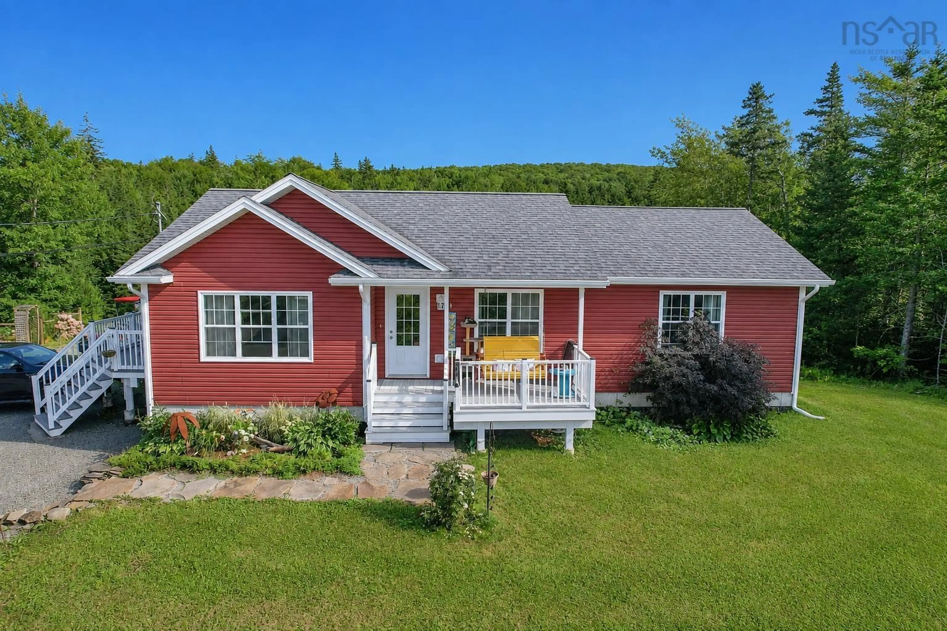 A pic from outside/outdoor area/front of a property/back of a property/a pic from drone, unknown for 3975 East Bay Hwy, East Bay Nova Scotia B1J 1M4