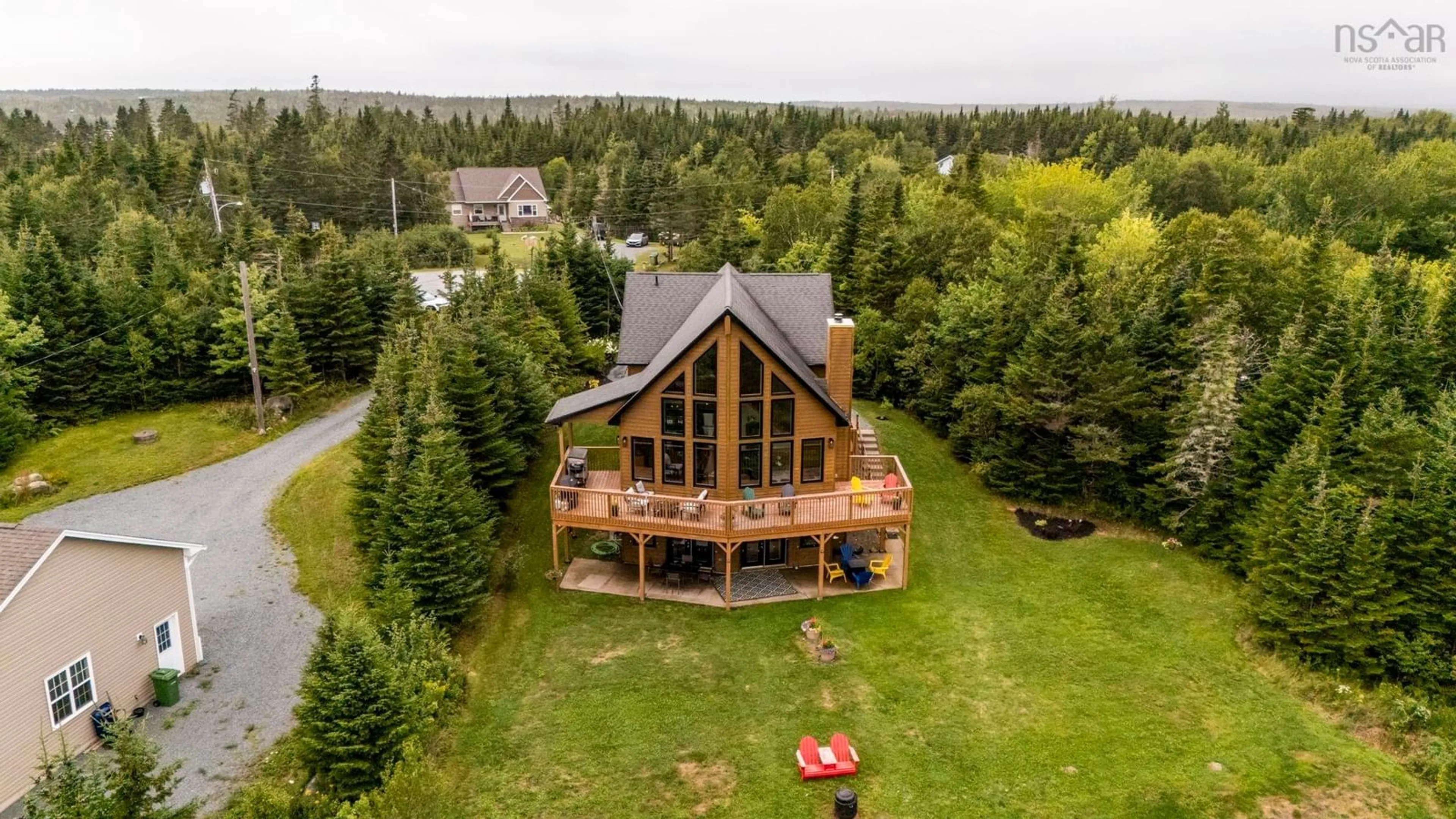 A pic from outside/outdoor area/front of a property/back of a property/a pic from drone, water/lake/river/ocean view for 5 Evergreen Cres, West Porters Lake Nova Scotia B3E 1L7