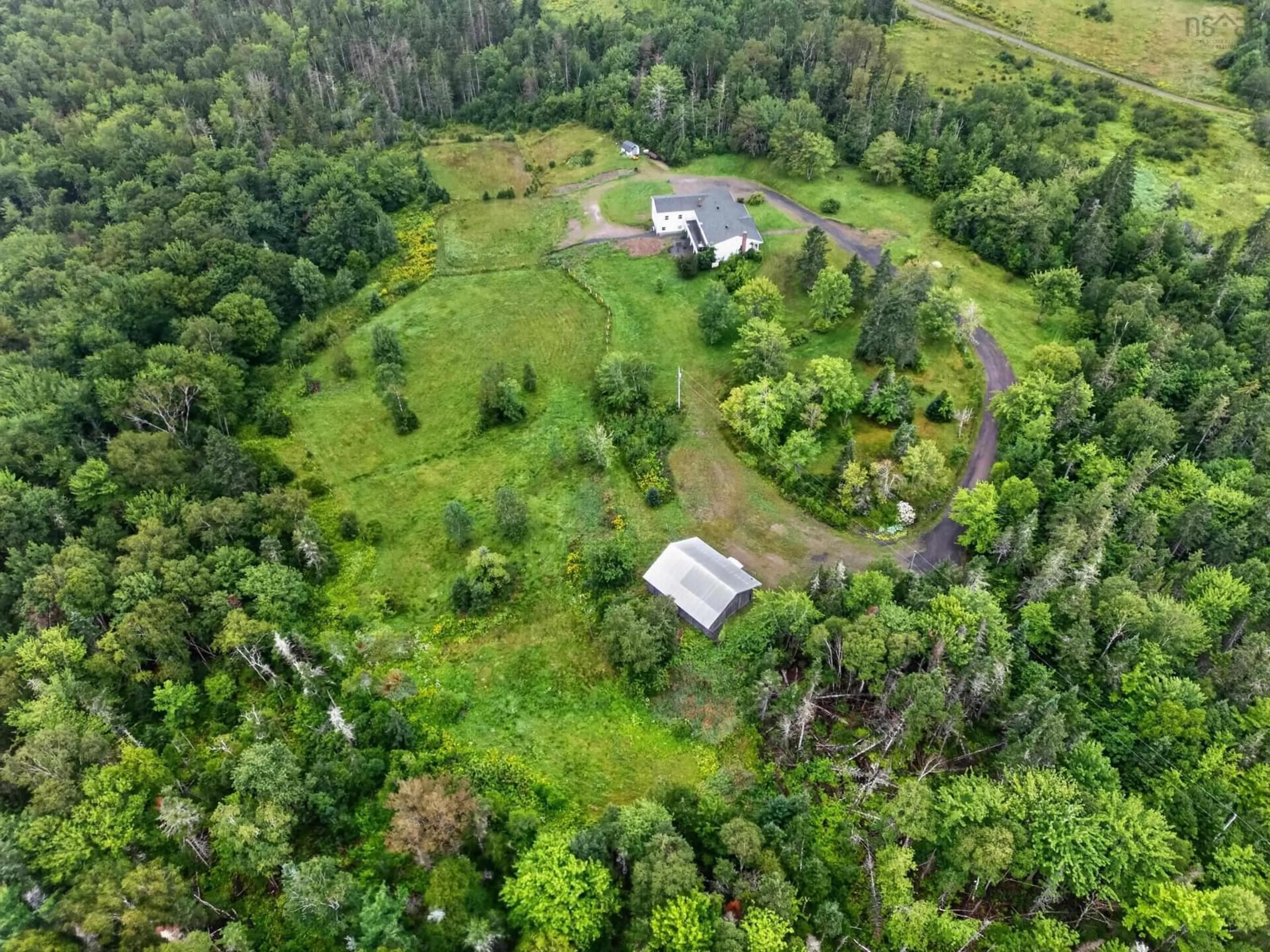 A pic from outside/outdoor area/front of a property/back of a property/a pic from drone, forest/trees view for 2489 Coxheath Rd, Coxheath Nova Scotia B1L 1A5