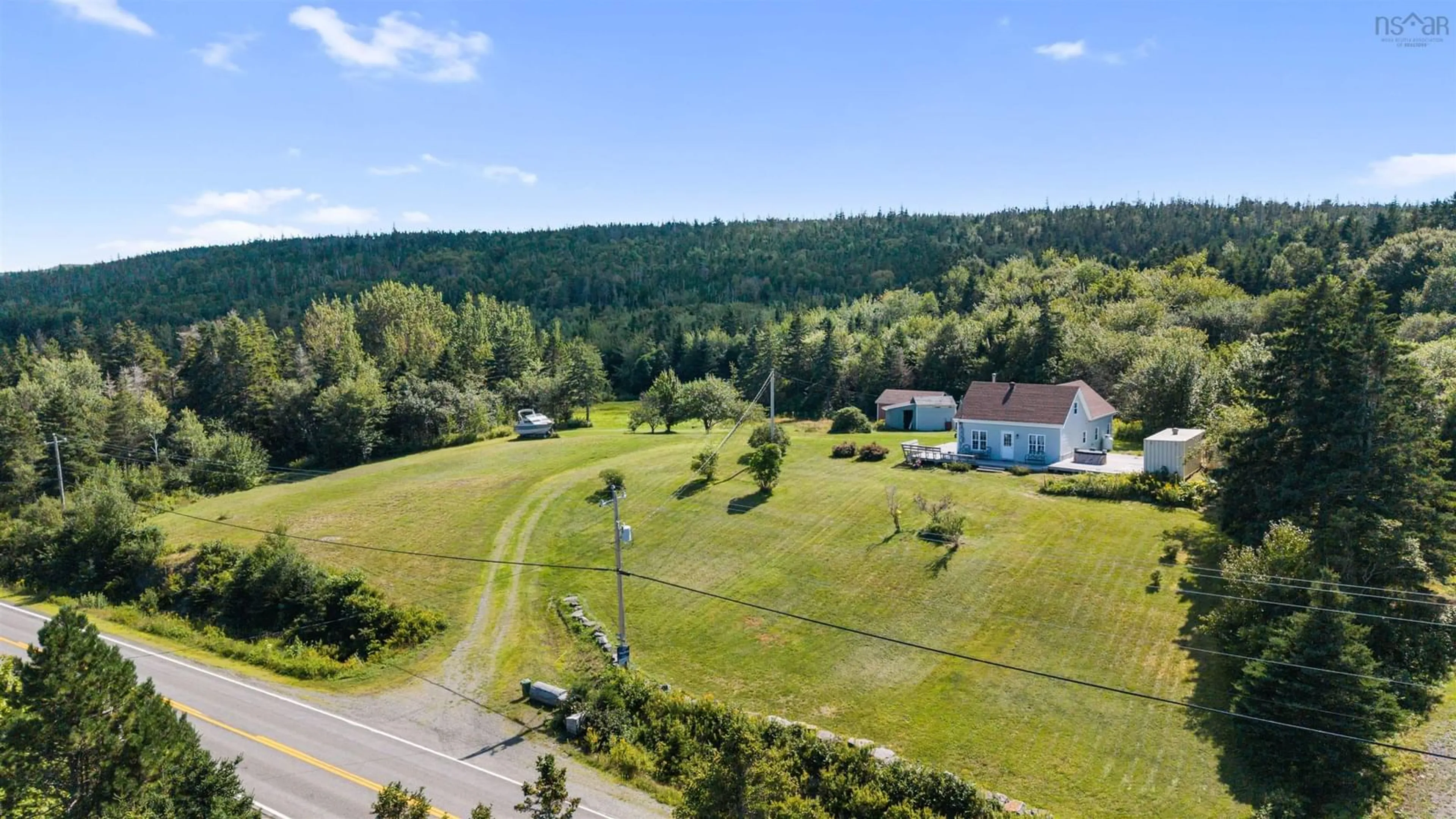 A pic from outside/outdoor area/front of a property/back of a property/a pic from drone, unknown for 5863 Highway 16, Queensport Nova Scotia B0H 1N0