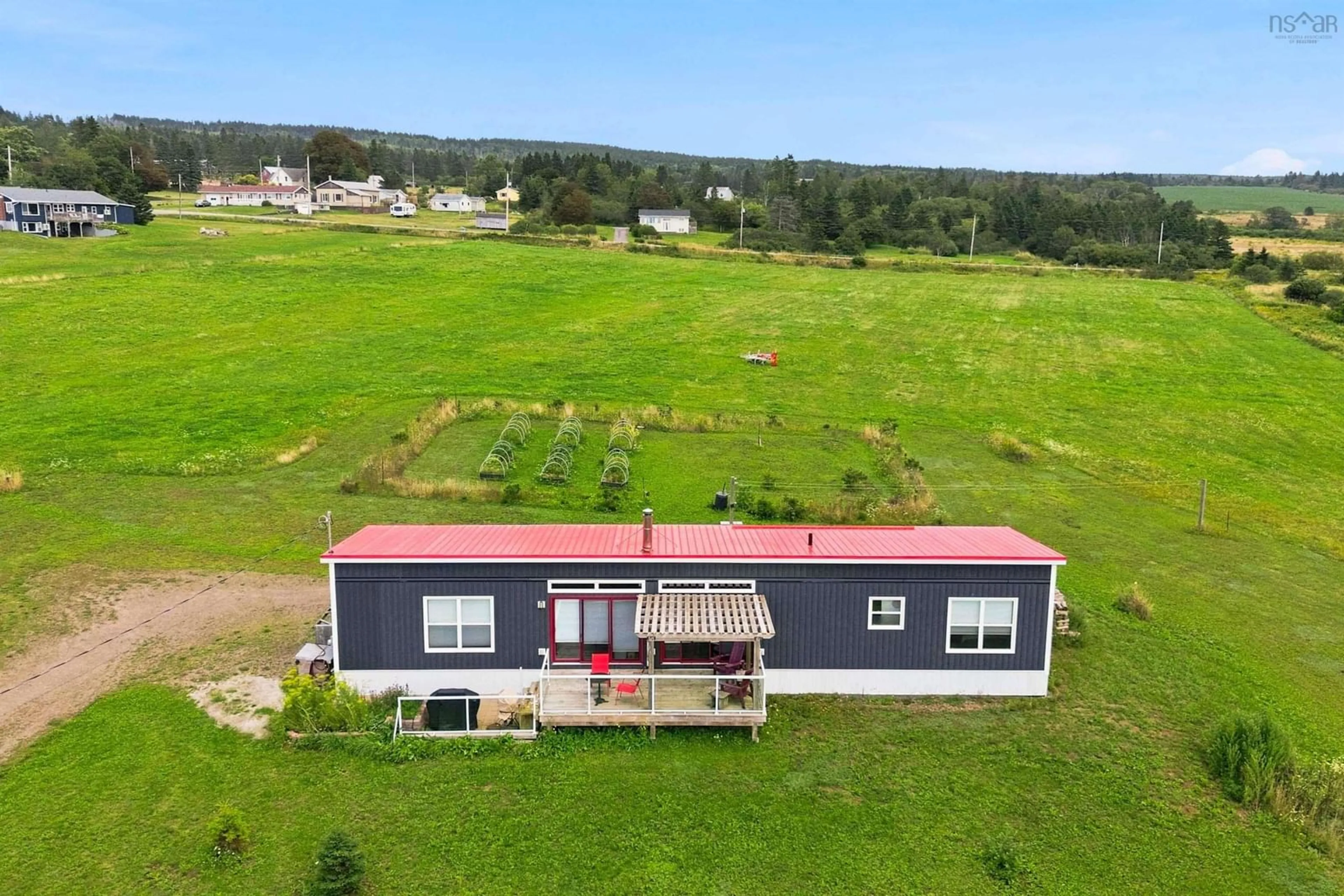 A pic from outside/outdoor area/front of a property/back of a property/a pic from drone, building for 1474 Cape Split Rd, Scots Bay Nova Scotia B0P 1H0