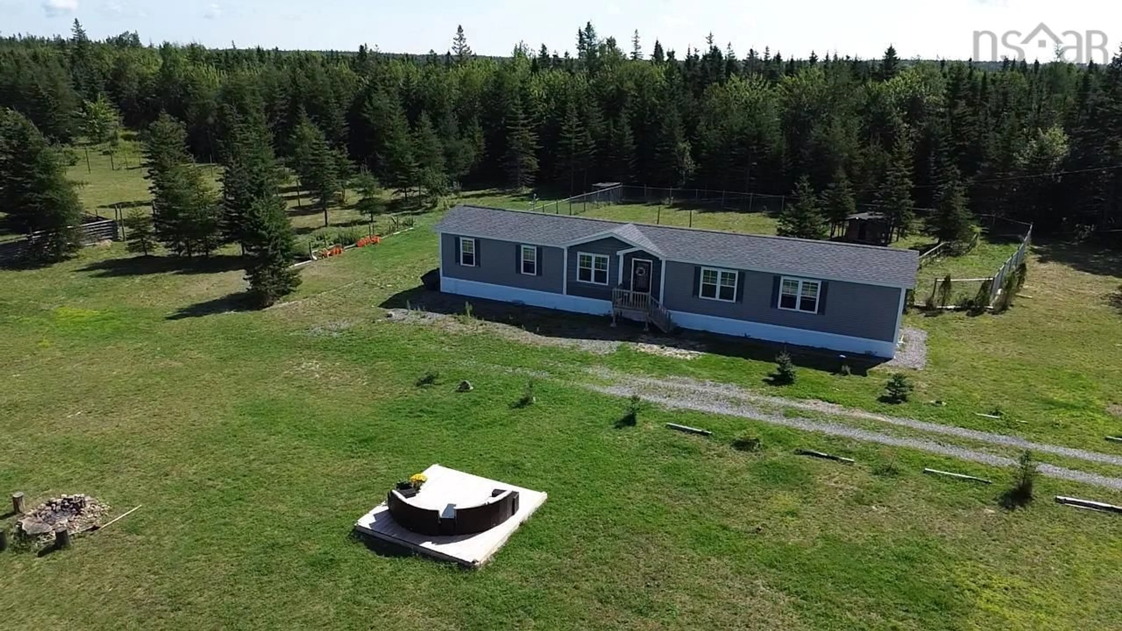 A pic from outside/outdoor area/front of a property/back of a property/a pic from drone, building for 2185 Louisbourg Highway Hwy, Mira Road Nova Scotia B1M 1A9