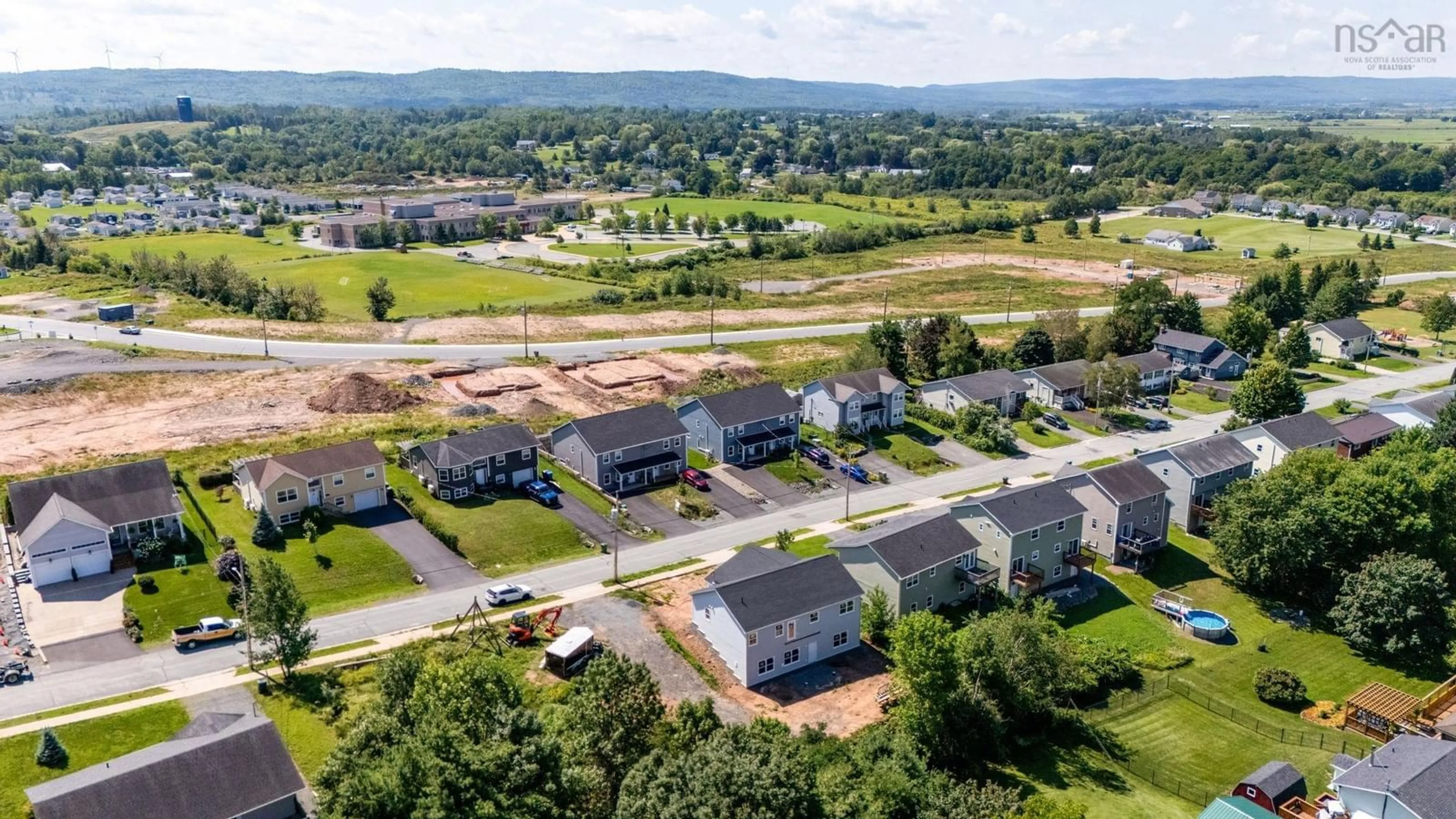 A pic from outside/outdoor area/front of a property/back of a property/a pic from drone, water/lake/river/ocean view for 75 Burgess Crescent, Windsor Nova Scotia B0N 2T0