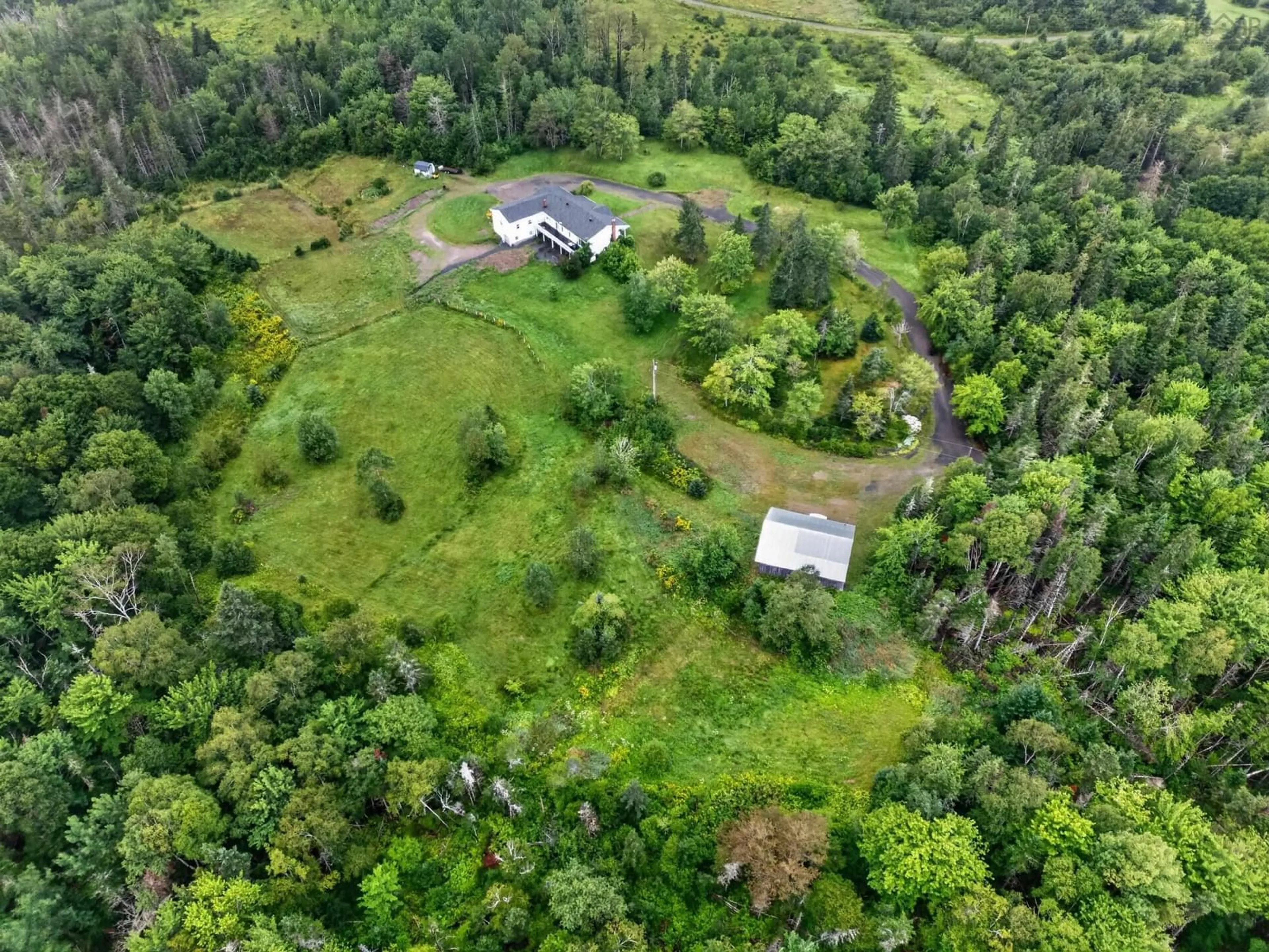 A pic from outside/outdoor area/front of a property/back of a property/a pic from drone, forest/trees view for 2489 Coxheath Rd, Coxheath Nova Scotia B1L 1A5