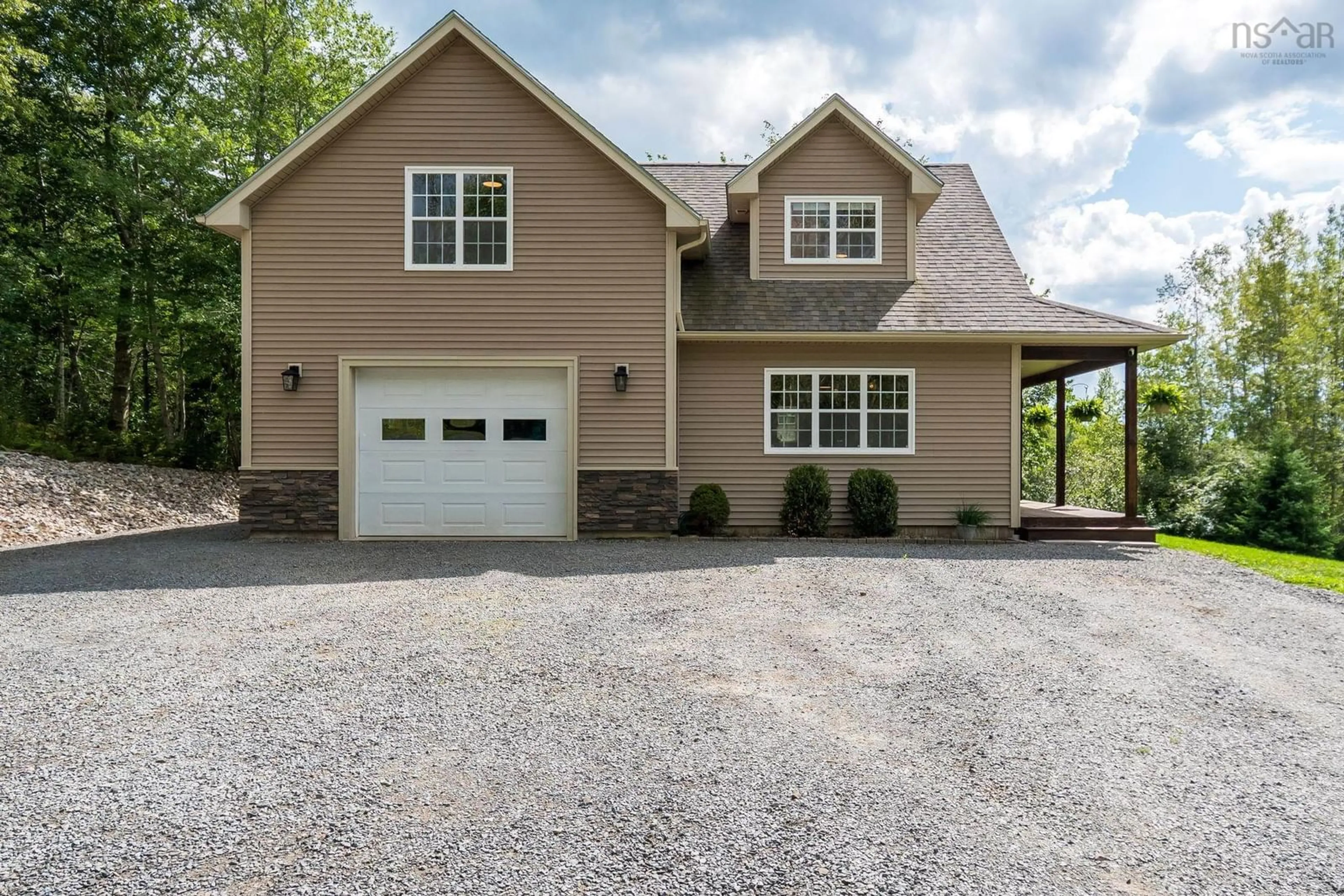 Home with vinyl exterior material, street for 1017 Bog Road, Falmouth Nova Scotia B0P 1L0