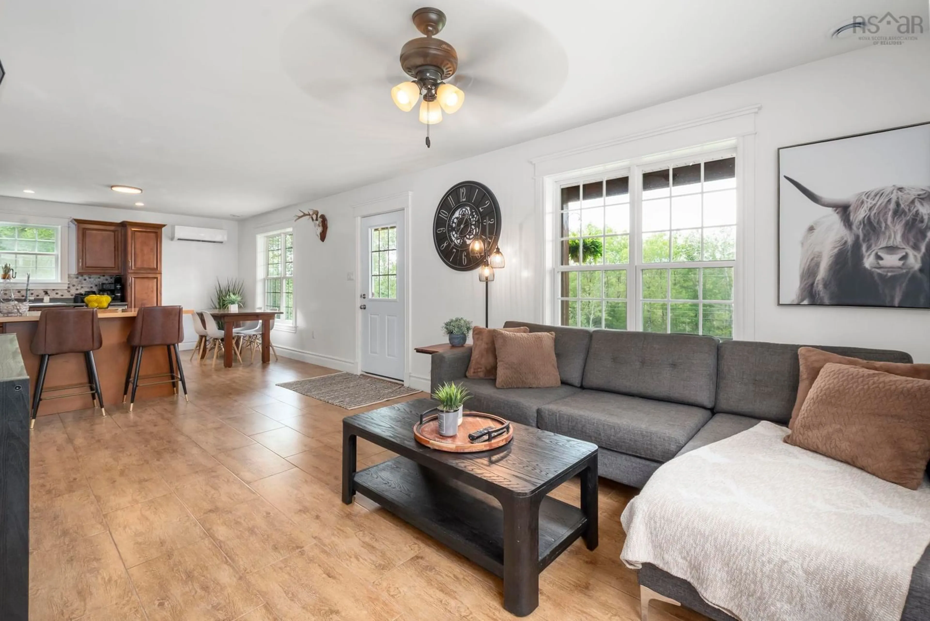 Living room with furniture, wood/laminate floor for 1017 Bog Road, Falmouth Nova Scotia B0P 1L0