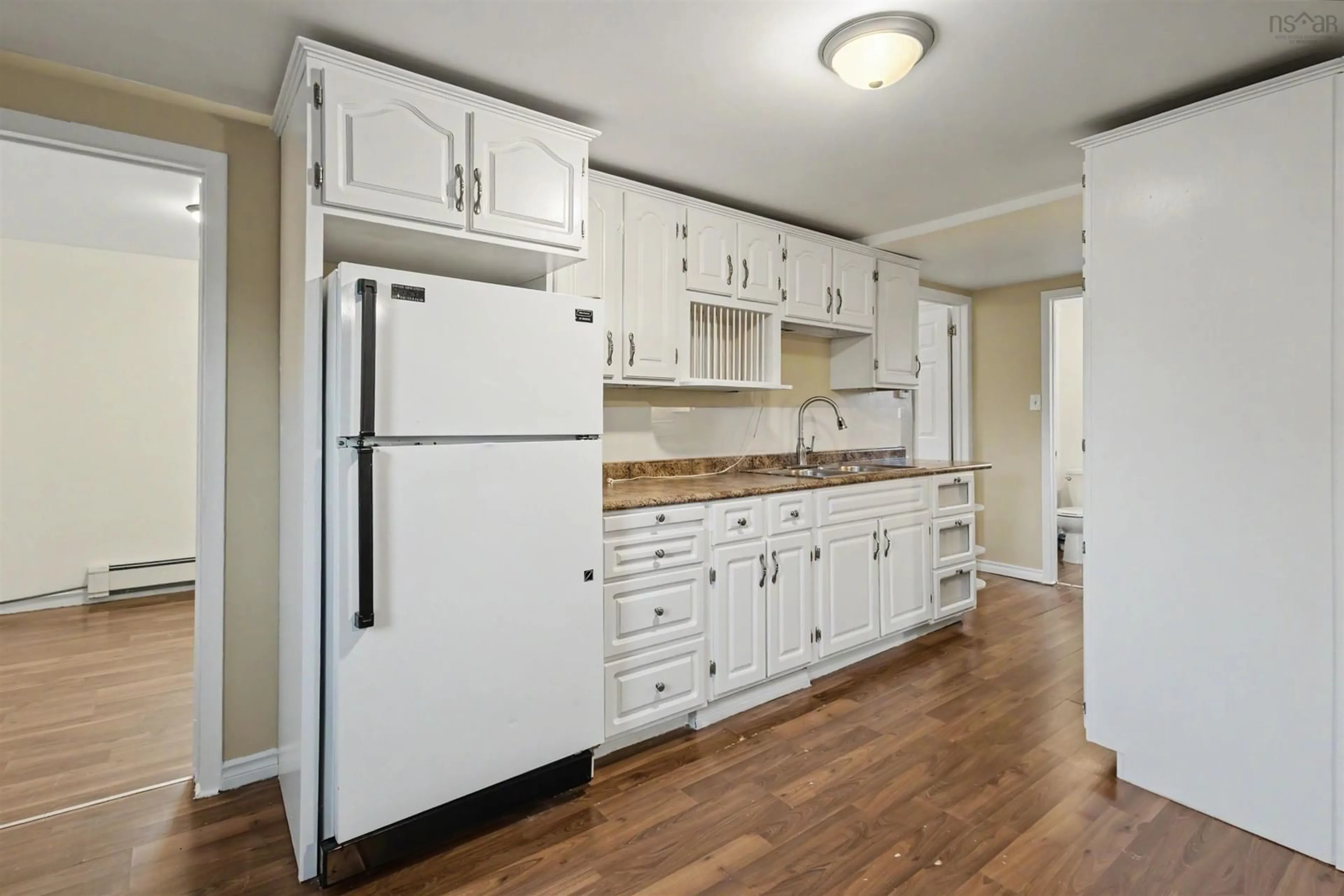 Standard kitchen, wood/laminate floor for 148 Highland St, Glace Bay Nova Scotia B1A 2V3