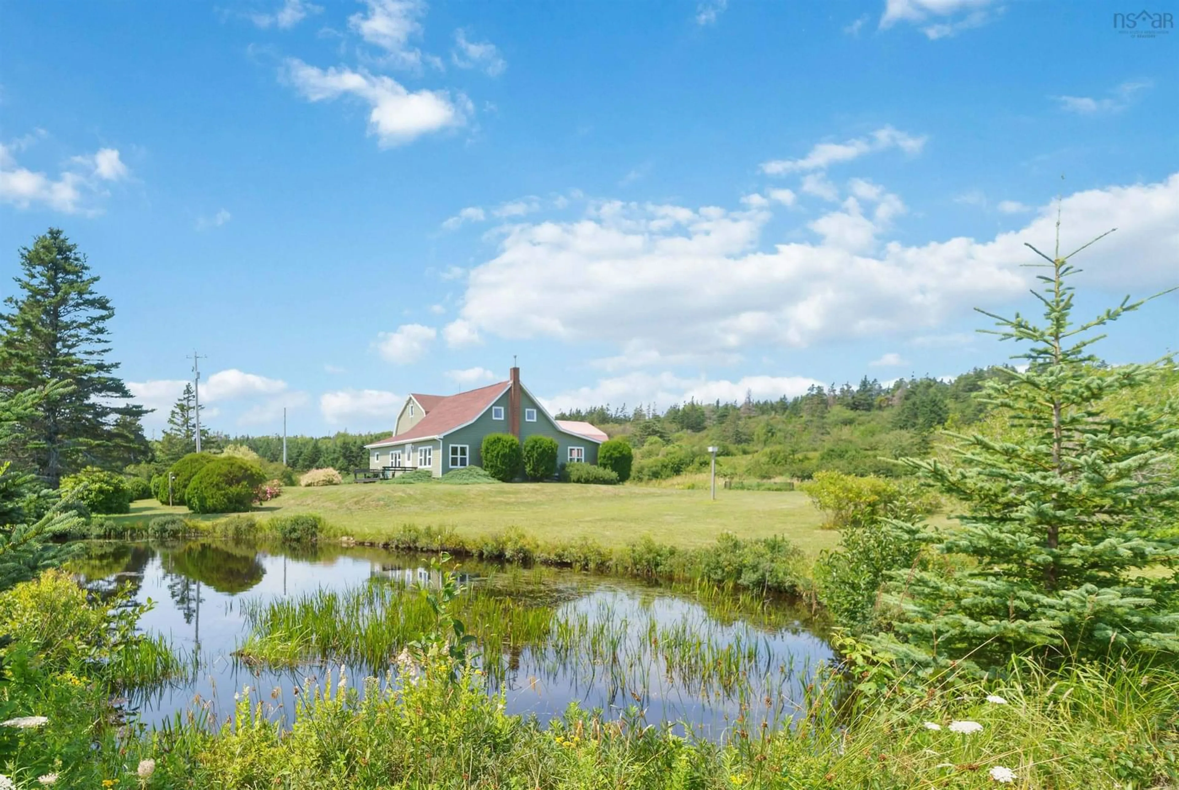 A pic from outside/outdoor area/front of a property/back of a property/a pic from drone, water/lake/river/ocean view for 3939 Highway 217, East Ferry Nova Scotia B0V 1E0