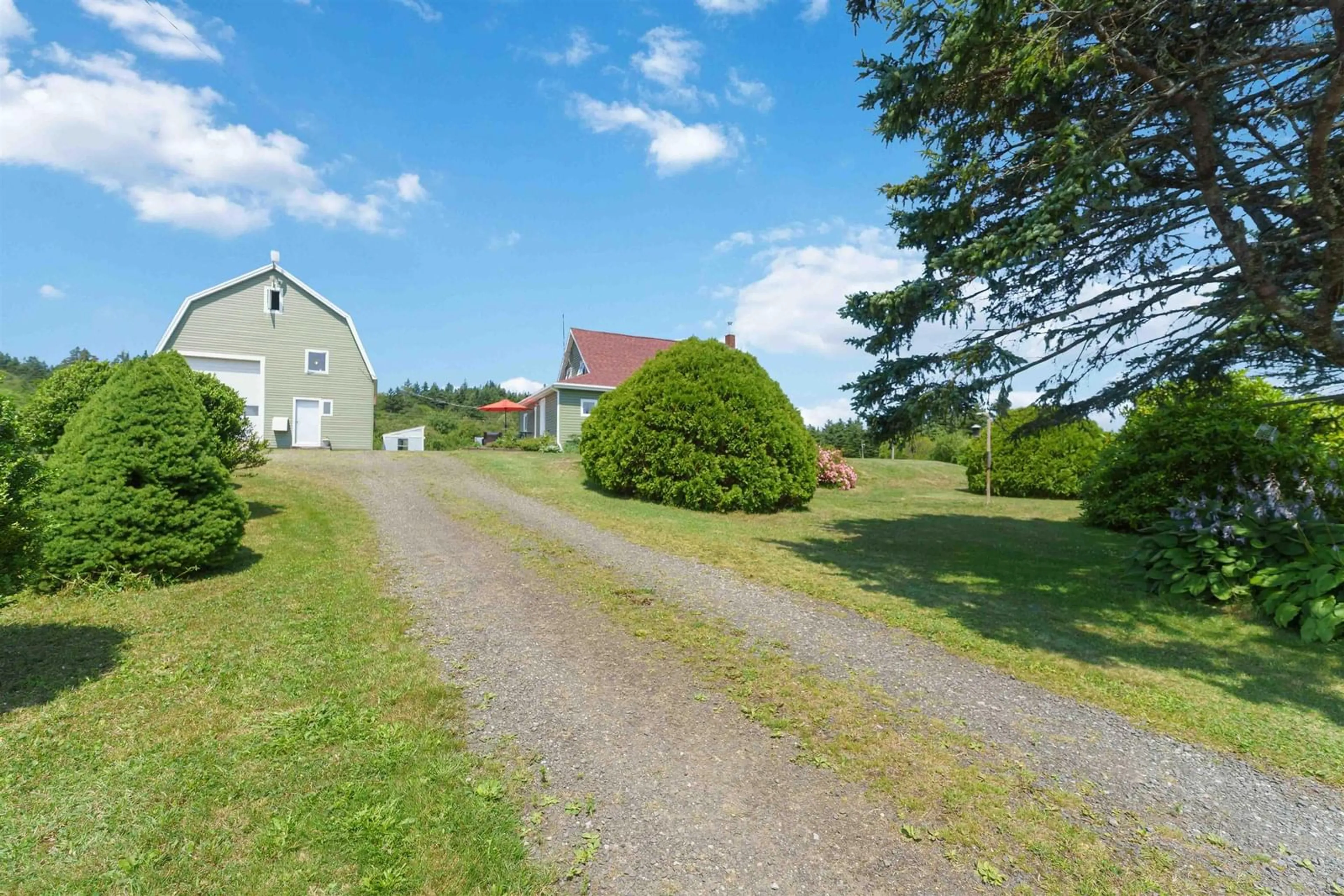 A pic from outside/outdoor area/front of a property/back of a property/a pic from drone, street for 3939 Highway 217, East Ferry Nova Scotia B0V 1E0