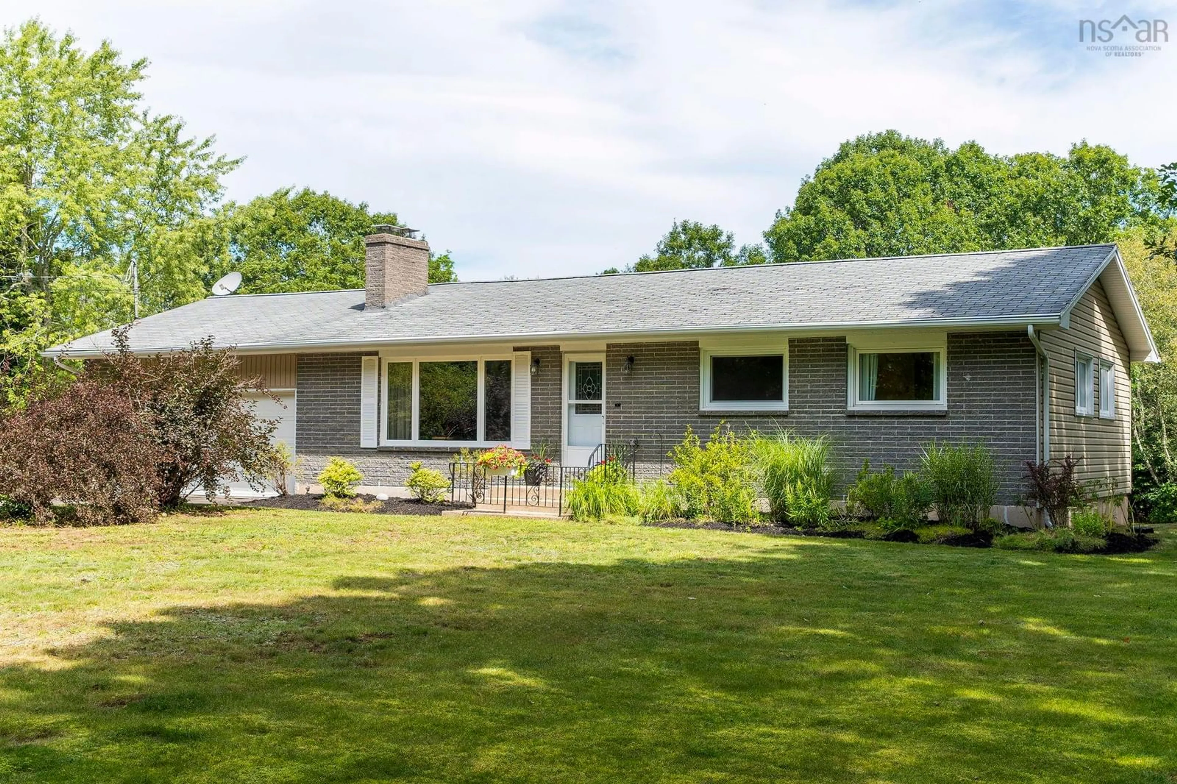 Home with vinyl exterior material, street for 62 Cook Ave, Wilmot Nova Scotia B0P 1W0