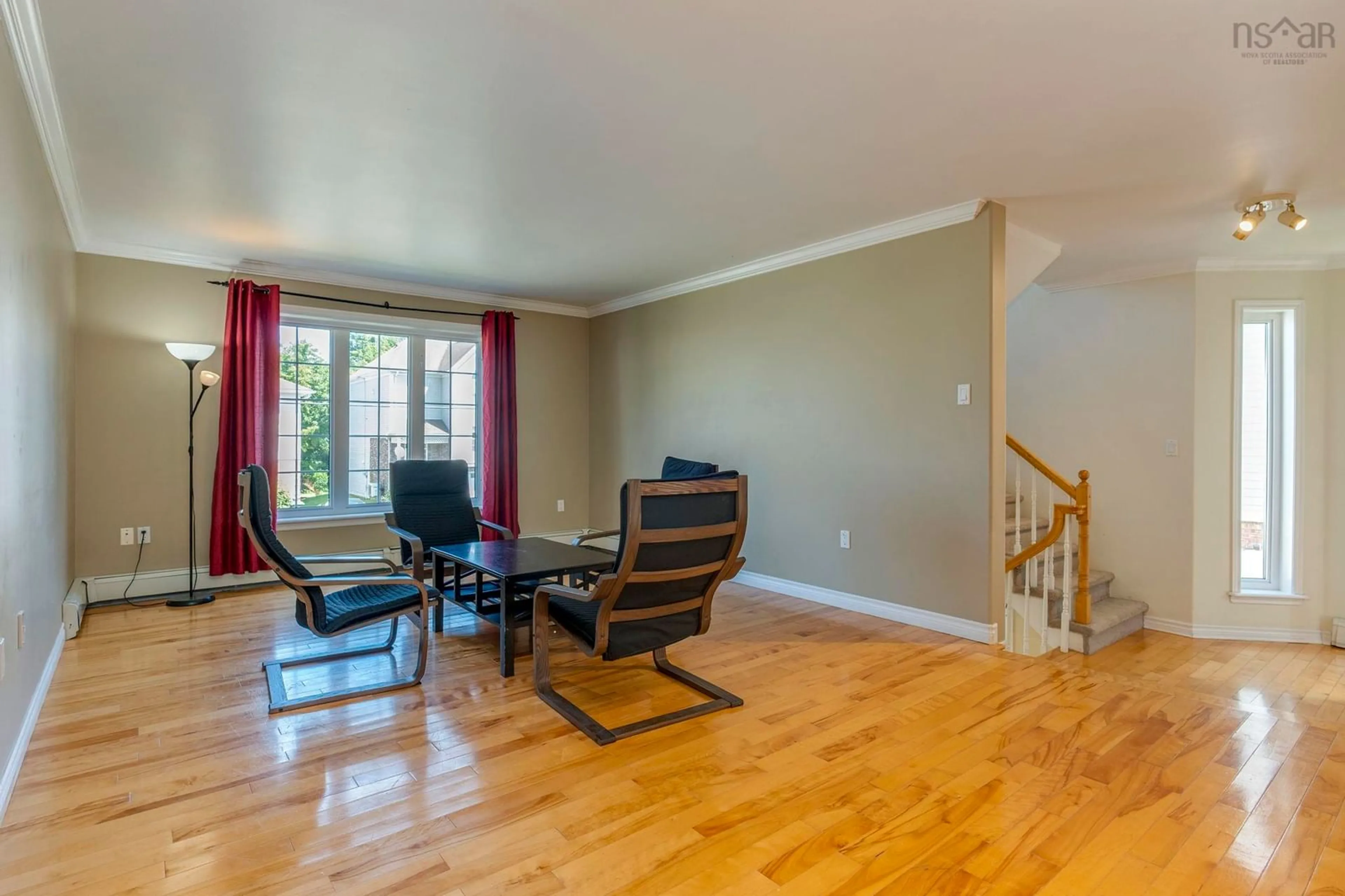 Living room with furniture, wood/laminate floor for Wembley Pl #8, Halifax Nova Scotia B3S 1E6