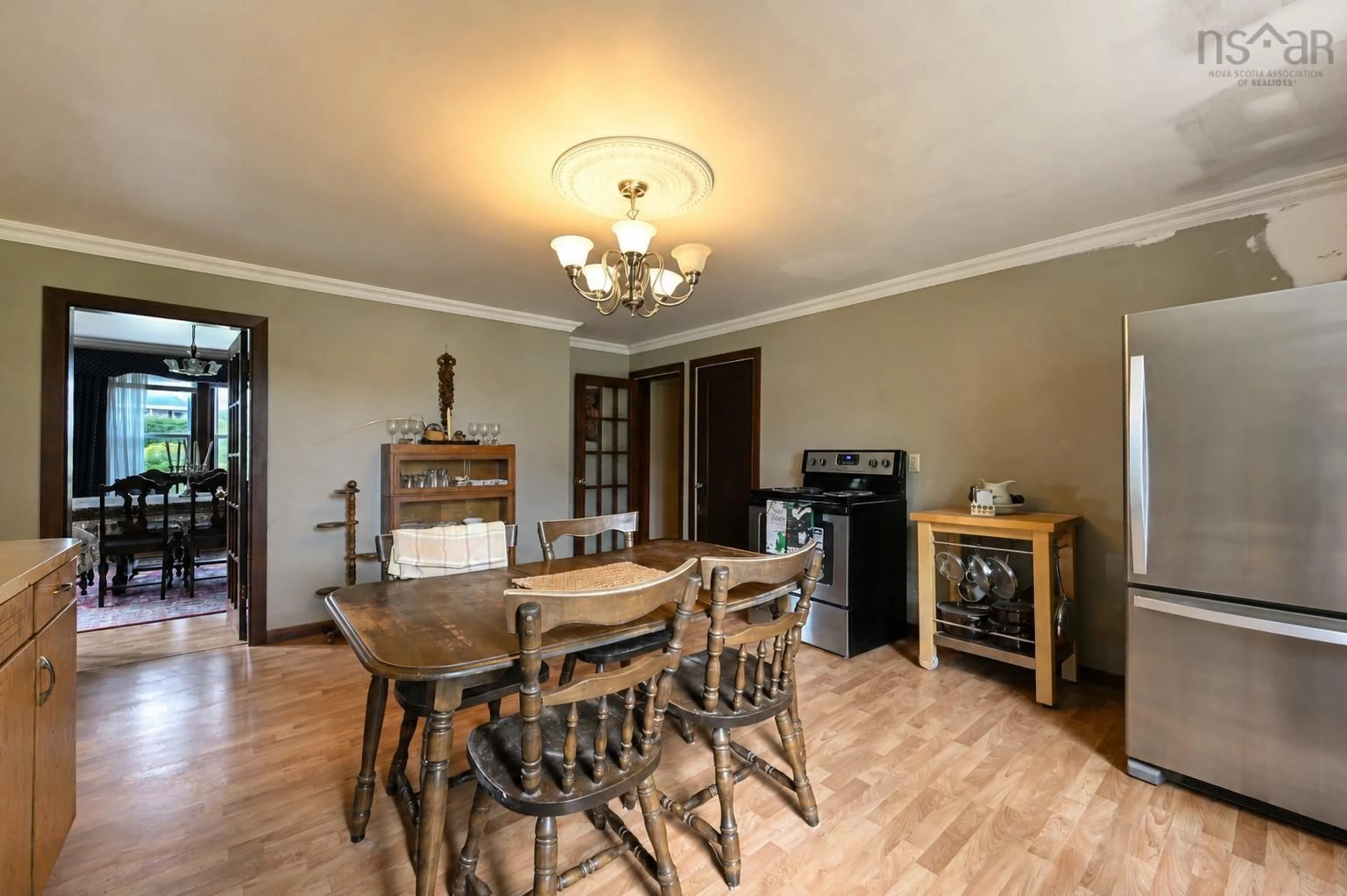 Dining room, wood/laminate floor for 74 Kings Rd, Dominion Nova Scotia B1S 2B5