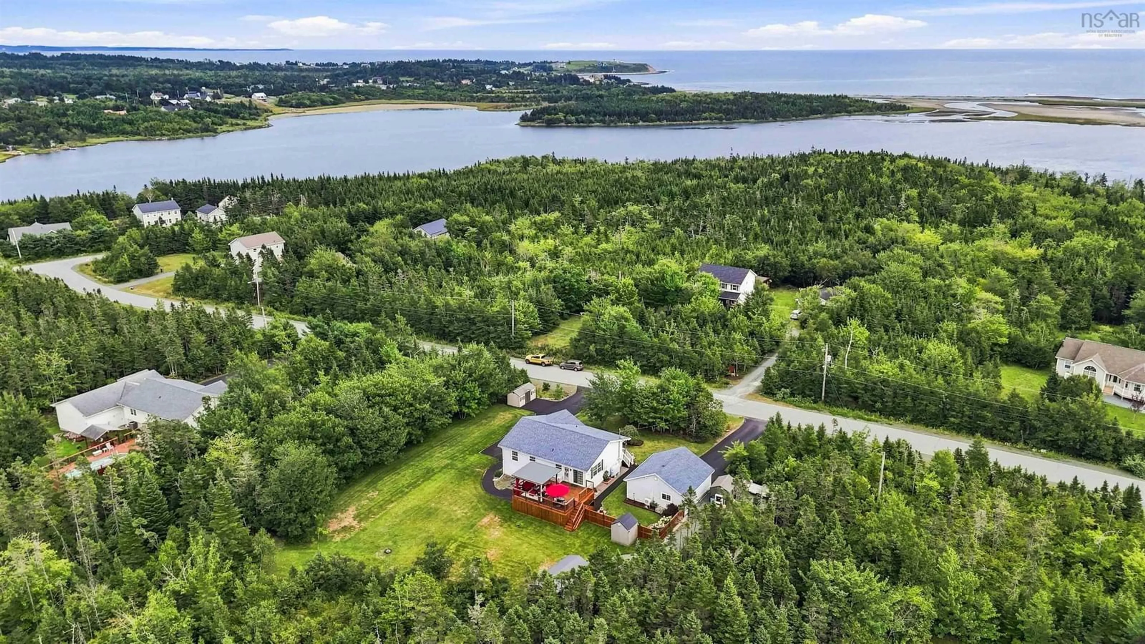 A pic from outside/outdoor area/front of a property/back of a property/a pic from drone, water/lake/river/ocean view for 80 Astour Dr, Eastern Passage Nova Scotia B3G 1S2