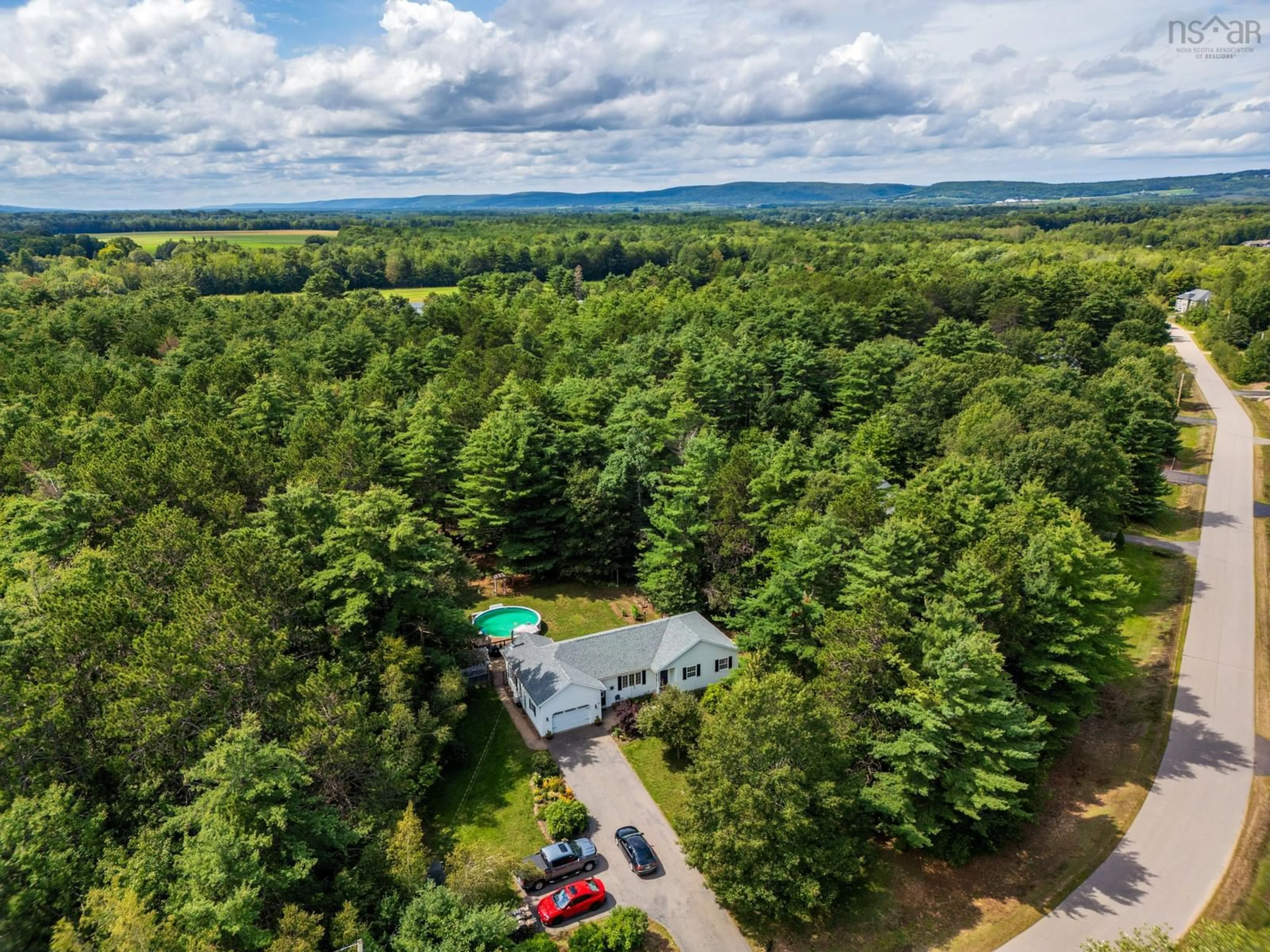 A pic from outside/outdoor area/front of a property/back of a property/a pic from drone, forest/trees view for 57 Dr Lewis Johnston St, South Farmington Nova Scotia B0P 1W0