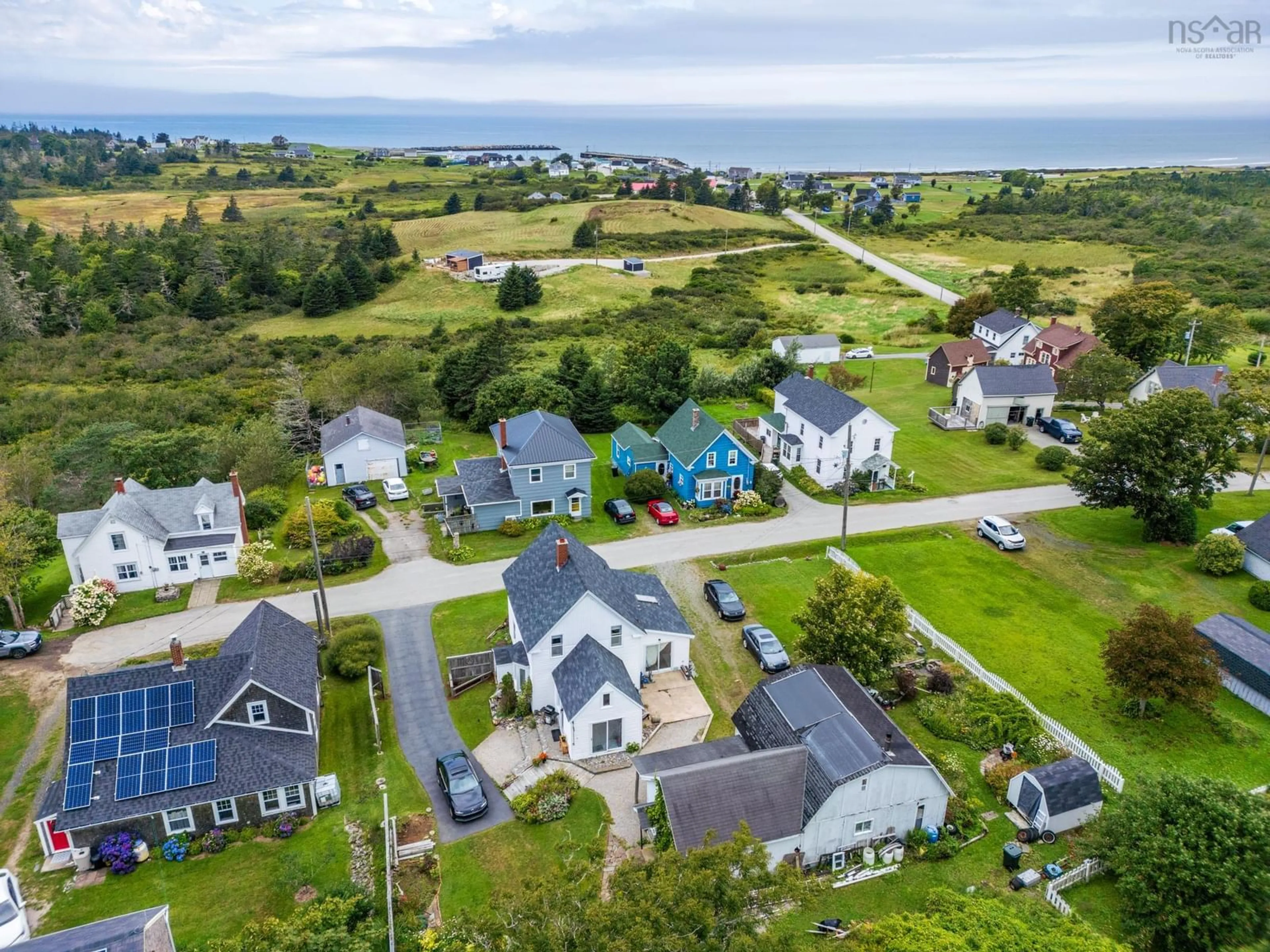 A pic from outside/outdoor area/front of a property/back of a property/a pic from drone, water/lake/river/ocean view for 21 Charles St, Port Maitland Nova Scotia B5A 5R8