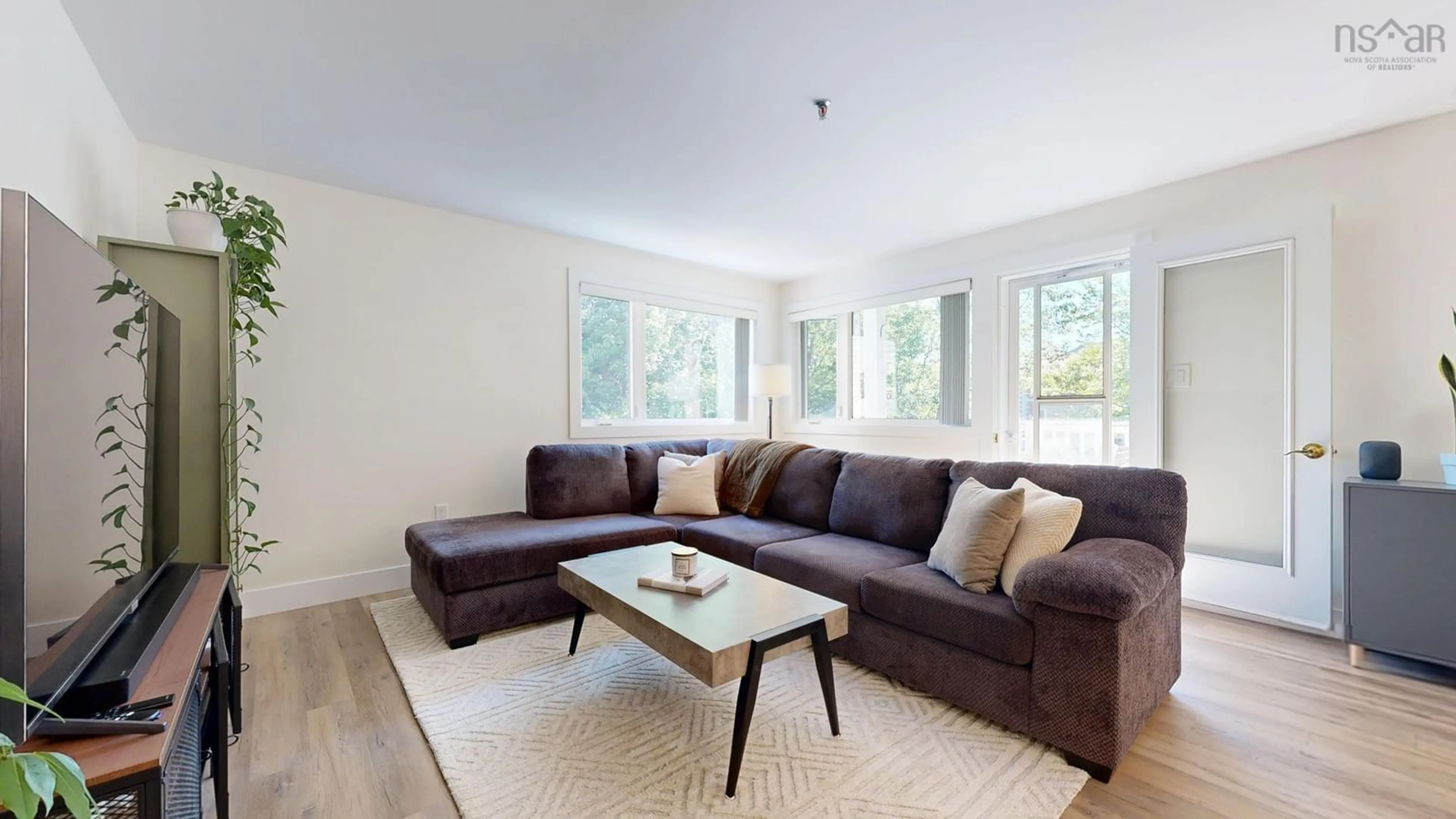 Living room with furniture, wood/laminate floor for 118 Farnham Gate Rd #204, Halifax Nova Scotia B3M 4A1