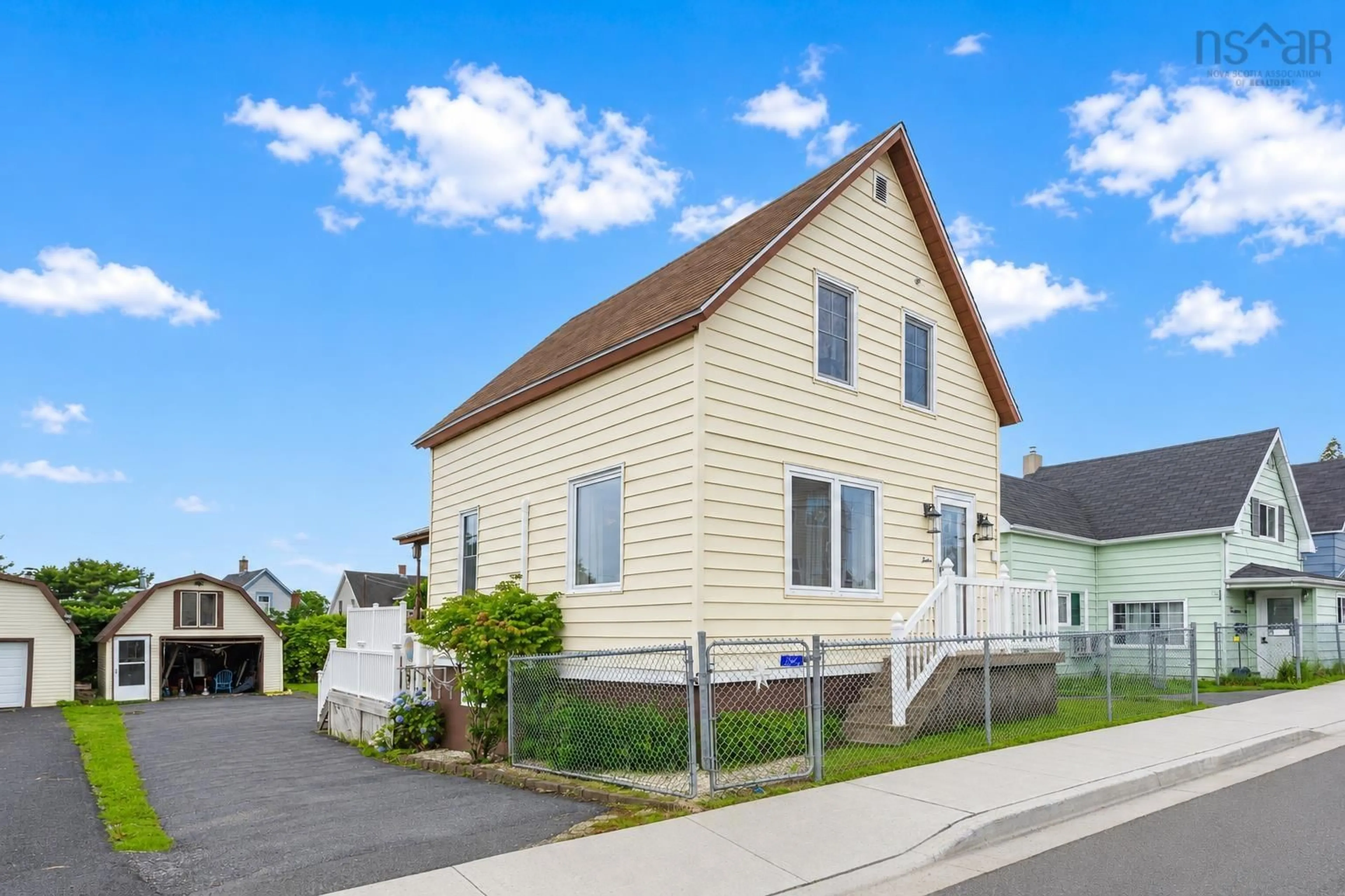 Home with vinyl exterior material, street for 12 Minto St, North Sydney Nova Scotia B2A 2R6