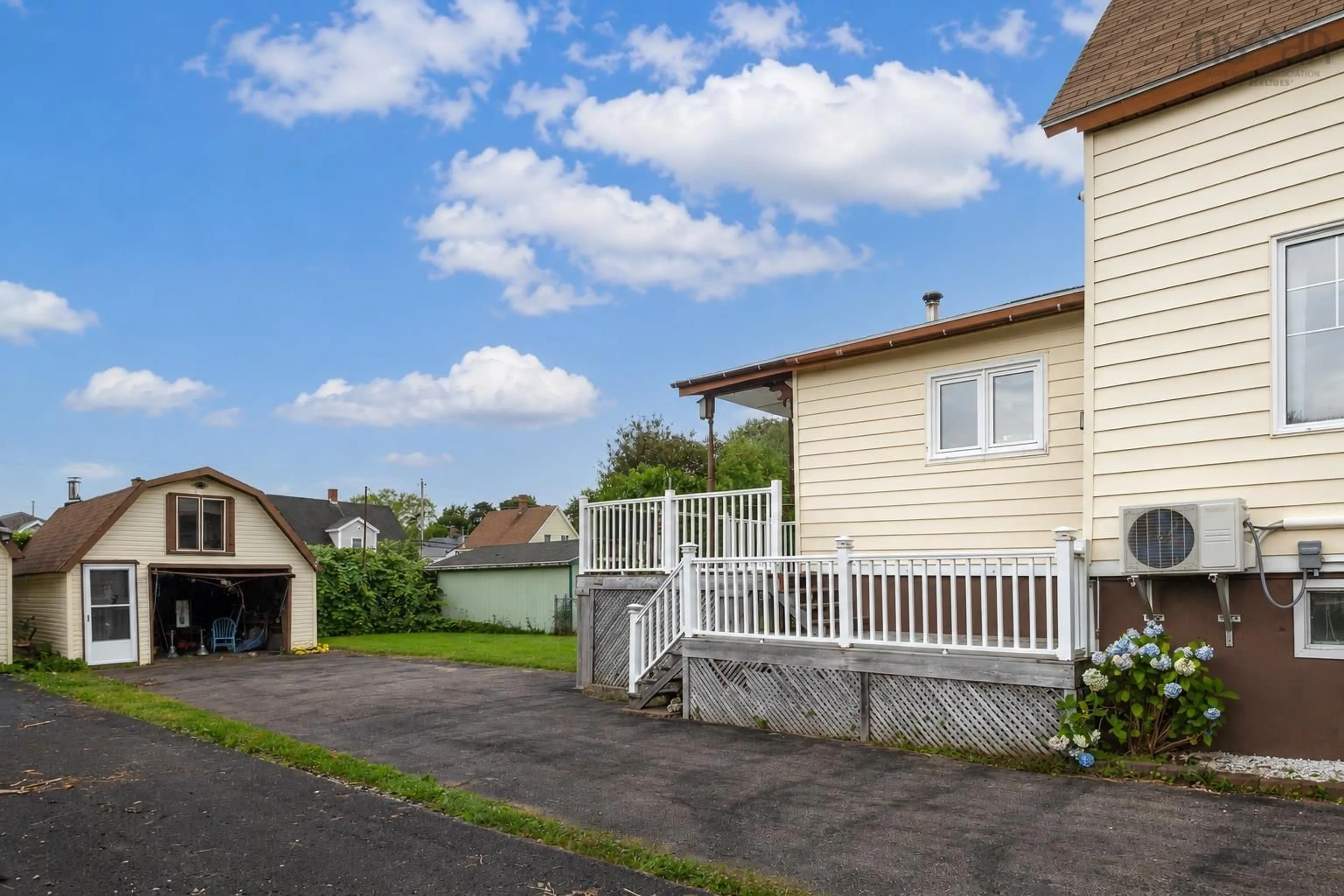 A pic from outside/outdoor area/front of a property/back of a property/a pic from drone, street for 12 Minto St, North Sydney Nova Scotia B2A 2R6