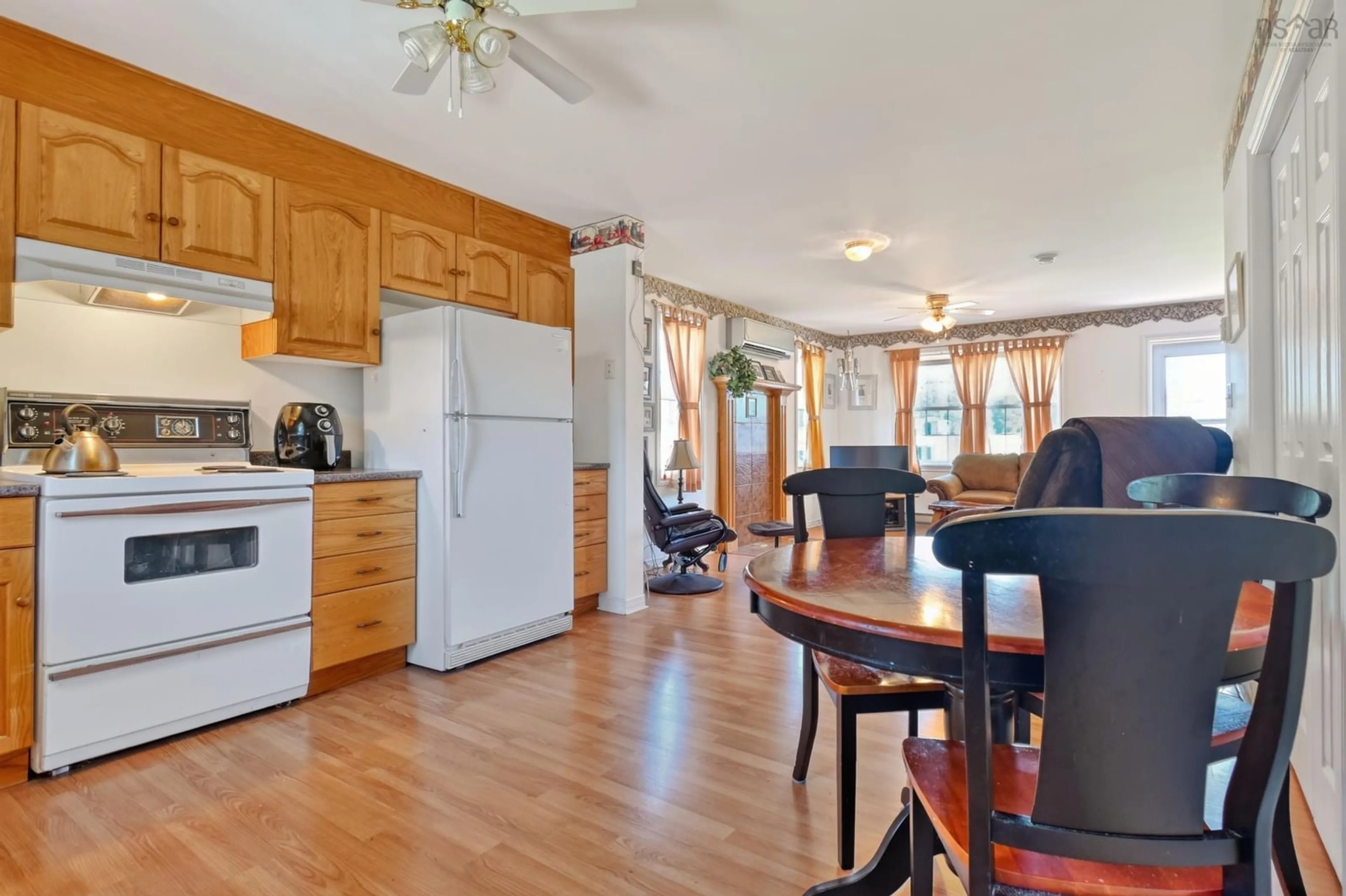 Open concept kitchen, wood/laminate floor for 70 Little Harbour Rd, Lower L'Ardoise Nova Scotia B0E 1W0