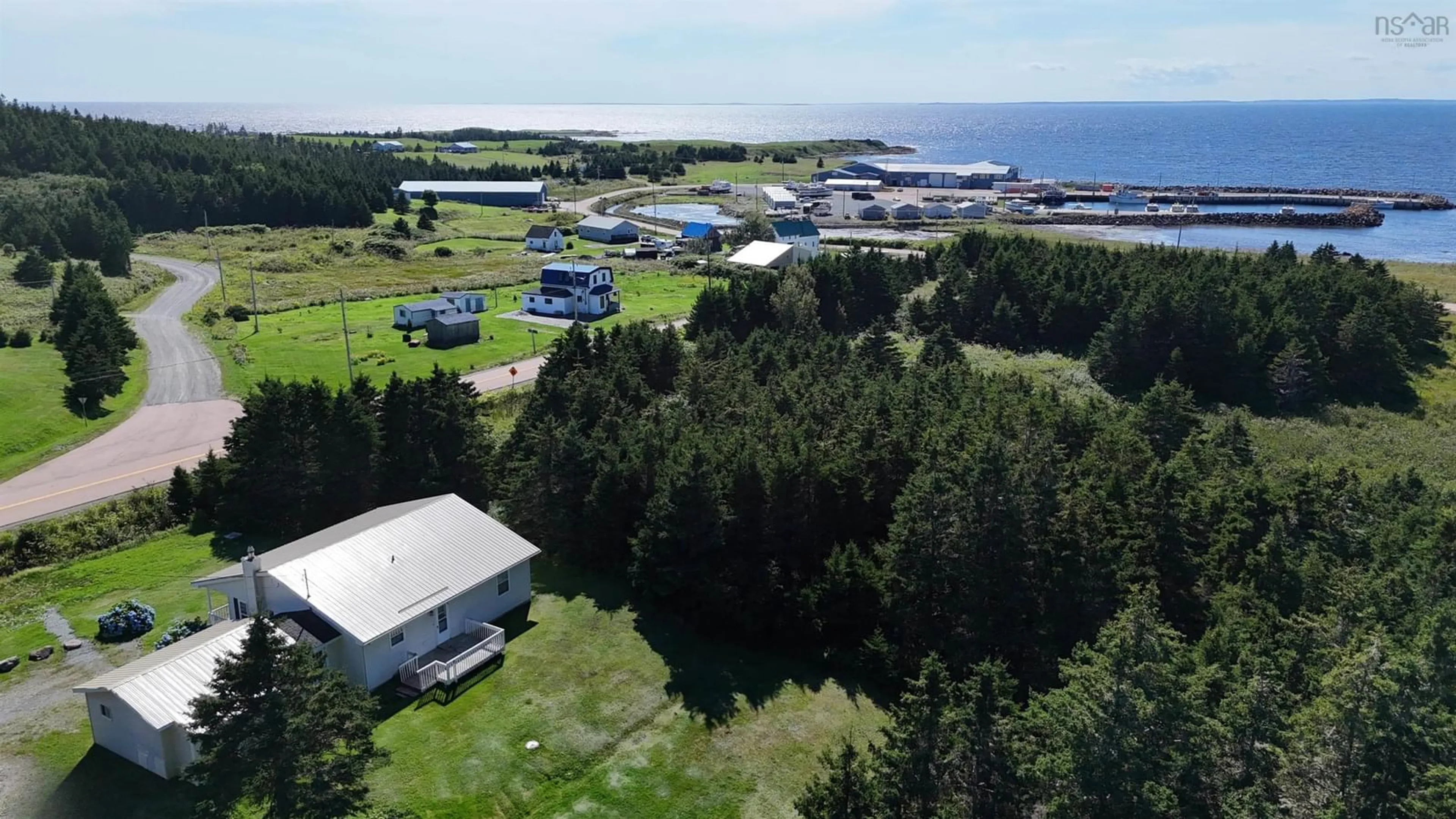 A pic from outside/outdoor area/front of a property/back of a property/a pic from drone, water/lake/river/ocean view for 70 Little Harbour Rd, Lower L'Ardoise Nova Scotia B0E 1W0