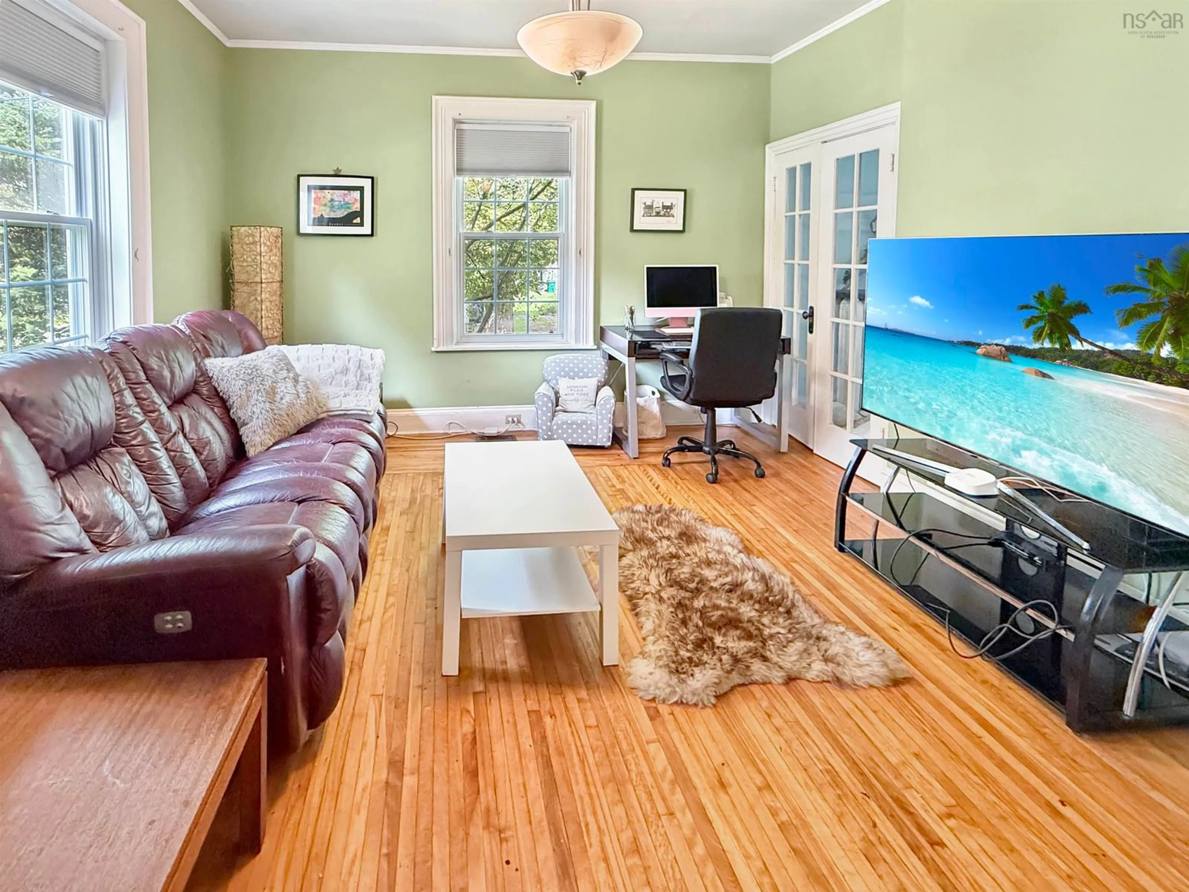 Living room with furniture, wood/laminate floor for 92 Mackay St, New Glasgow Nova Scotia B2H 3H7