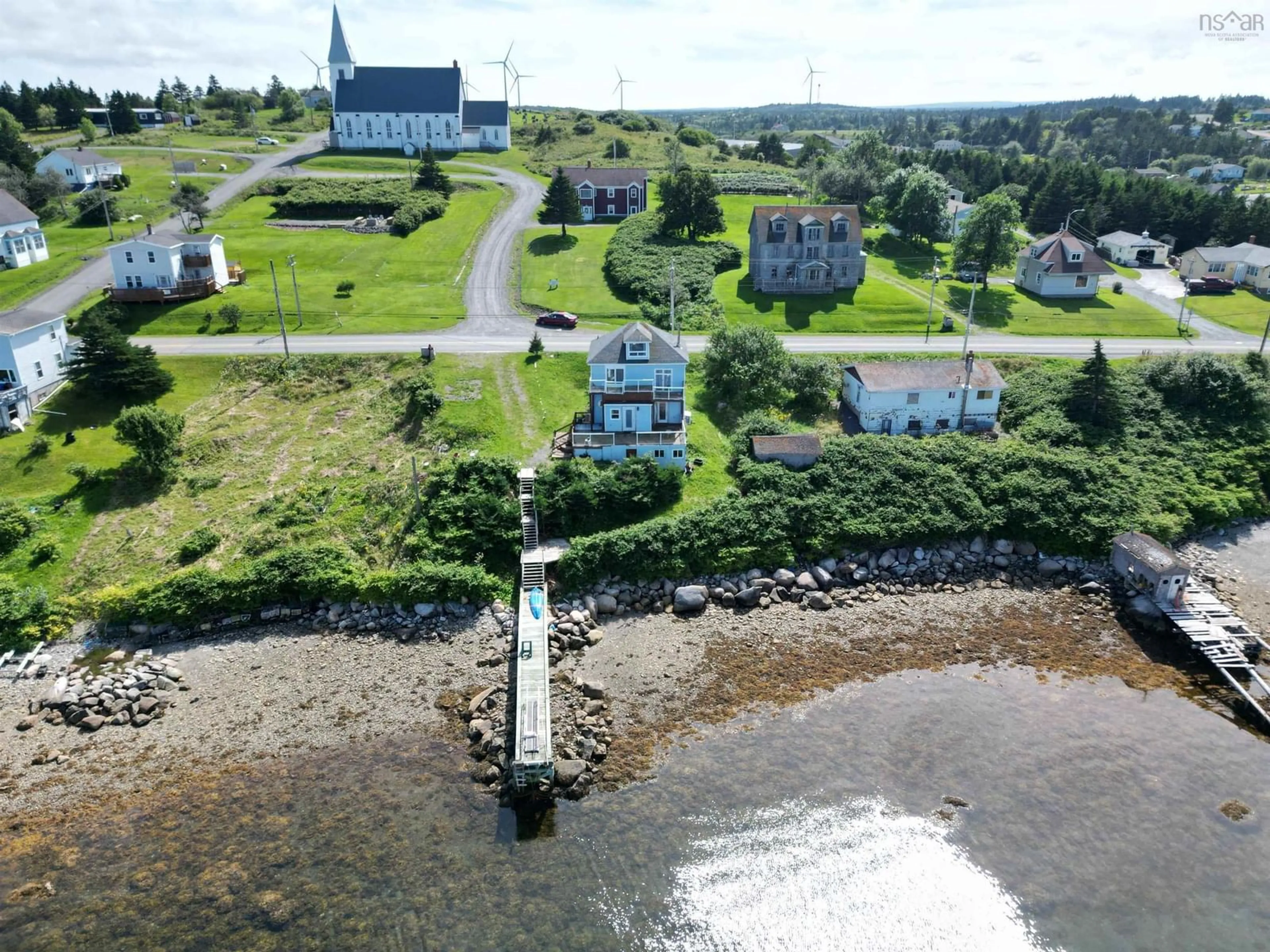 A pic from outside/outdoor area/front of a property/back of a property/a pic from drone, water/lake/river/ocean view for 1519 Union St, Canso Nova Scotia B0H 1H0