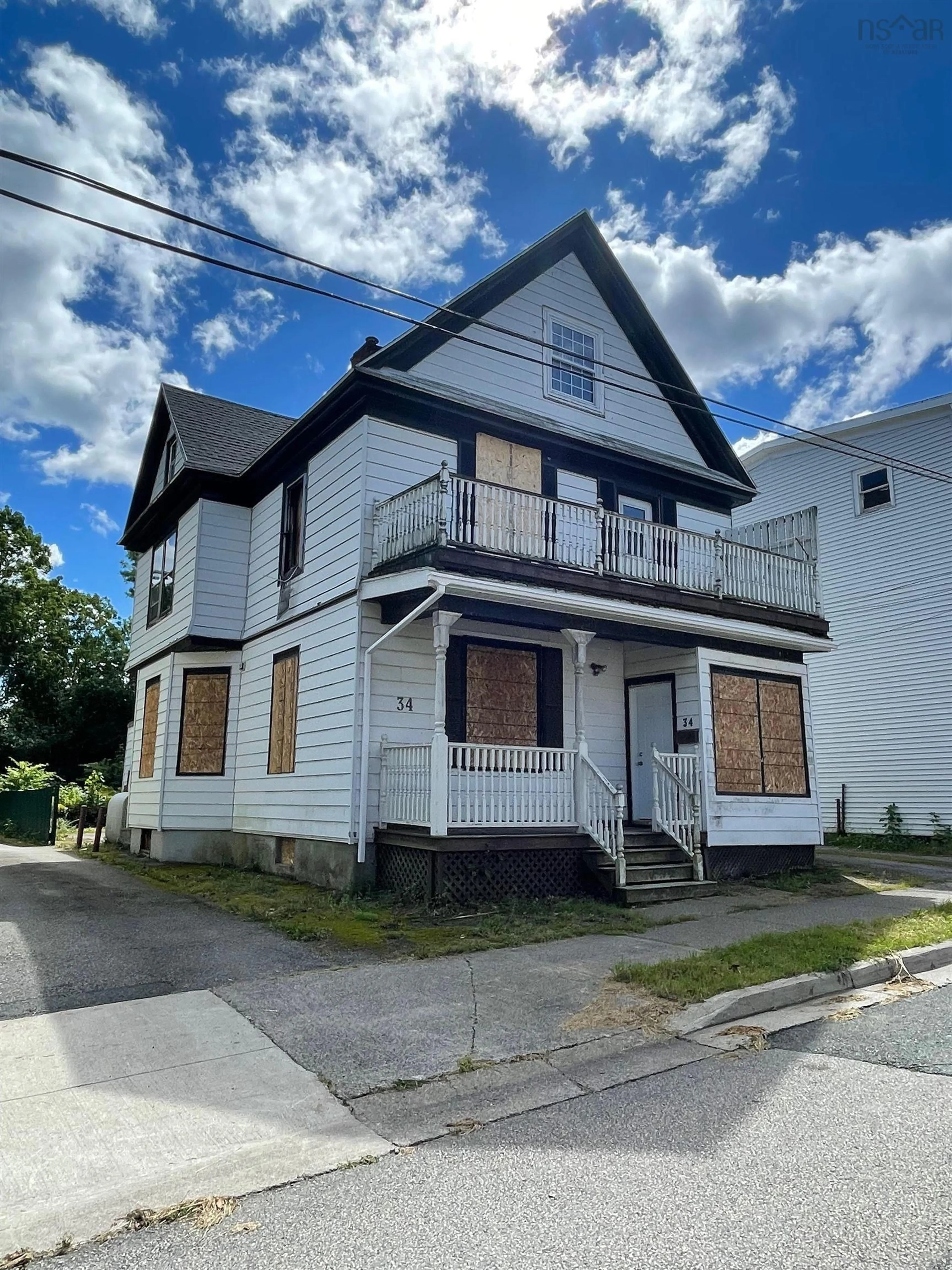 Home with vinyl exterior material, street for 34 Amelia St, Sydney Nova Scotia B1P 6C2