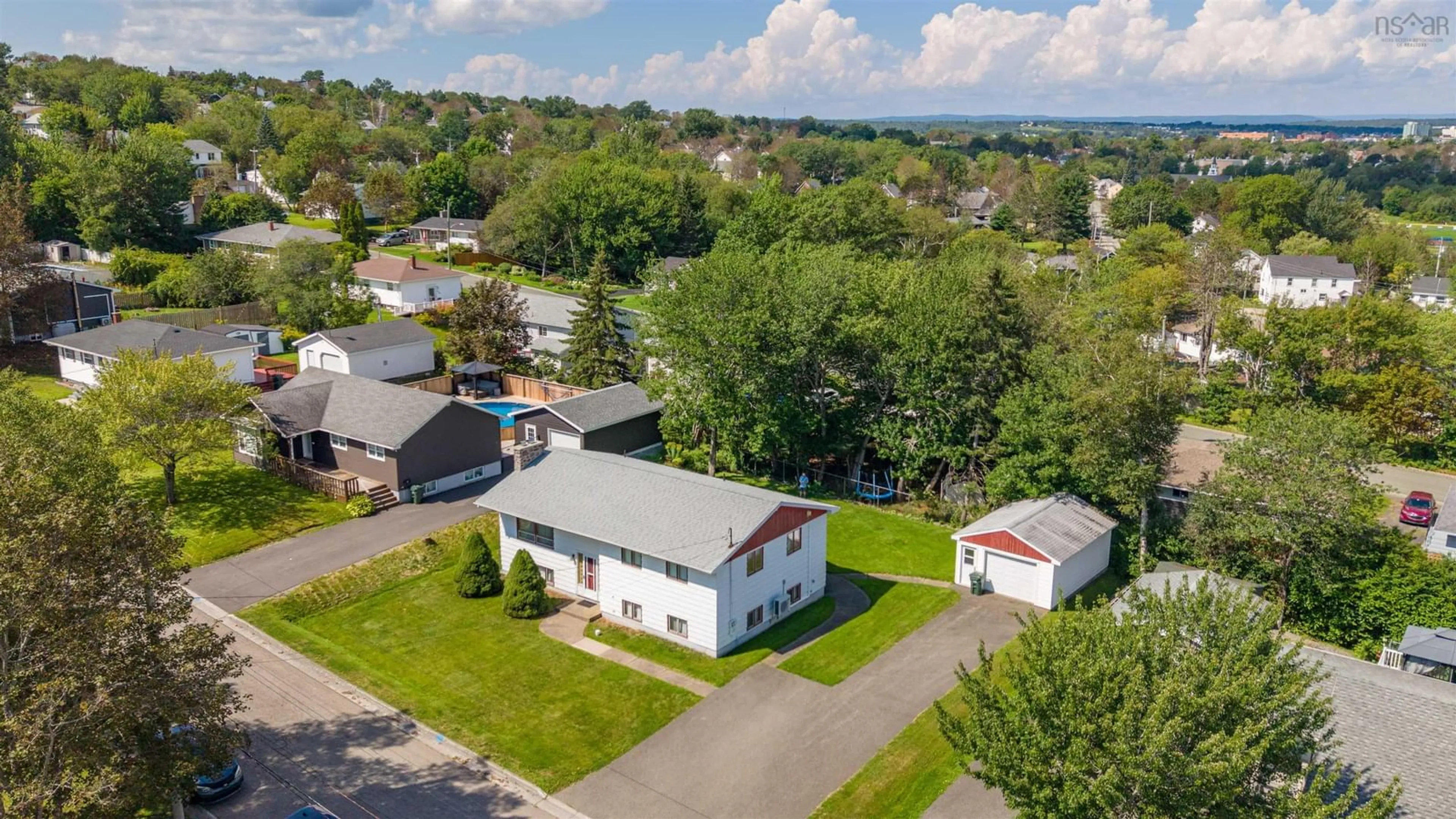 A pic from outside/outdoor area/front of a property/back of a property/a pic from drone, street for 135 Kennedy Ave, Sydney Nova Scotia B1P 3K9