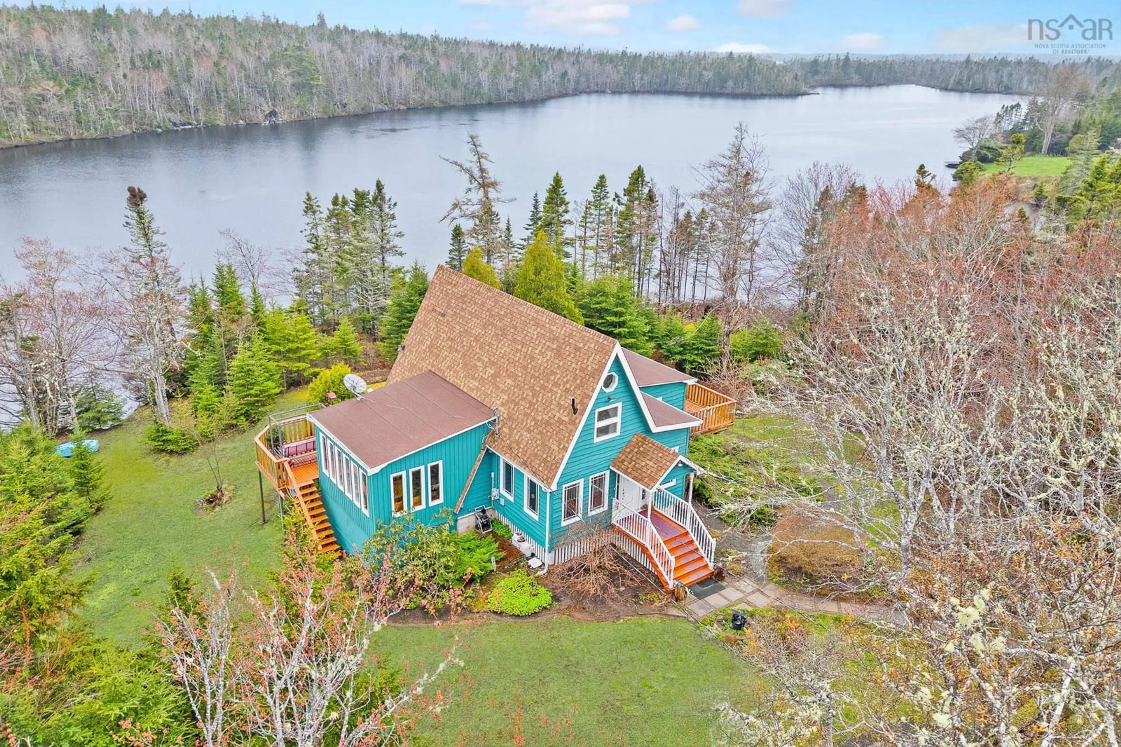 A pic from outside/outdoor area/front of a property/back of a property/a pic from drone, water/lake/river/ocean view for 11028 Highway 7, Lake Charlotte Nova Scotia B0J 2L0