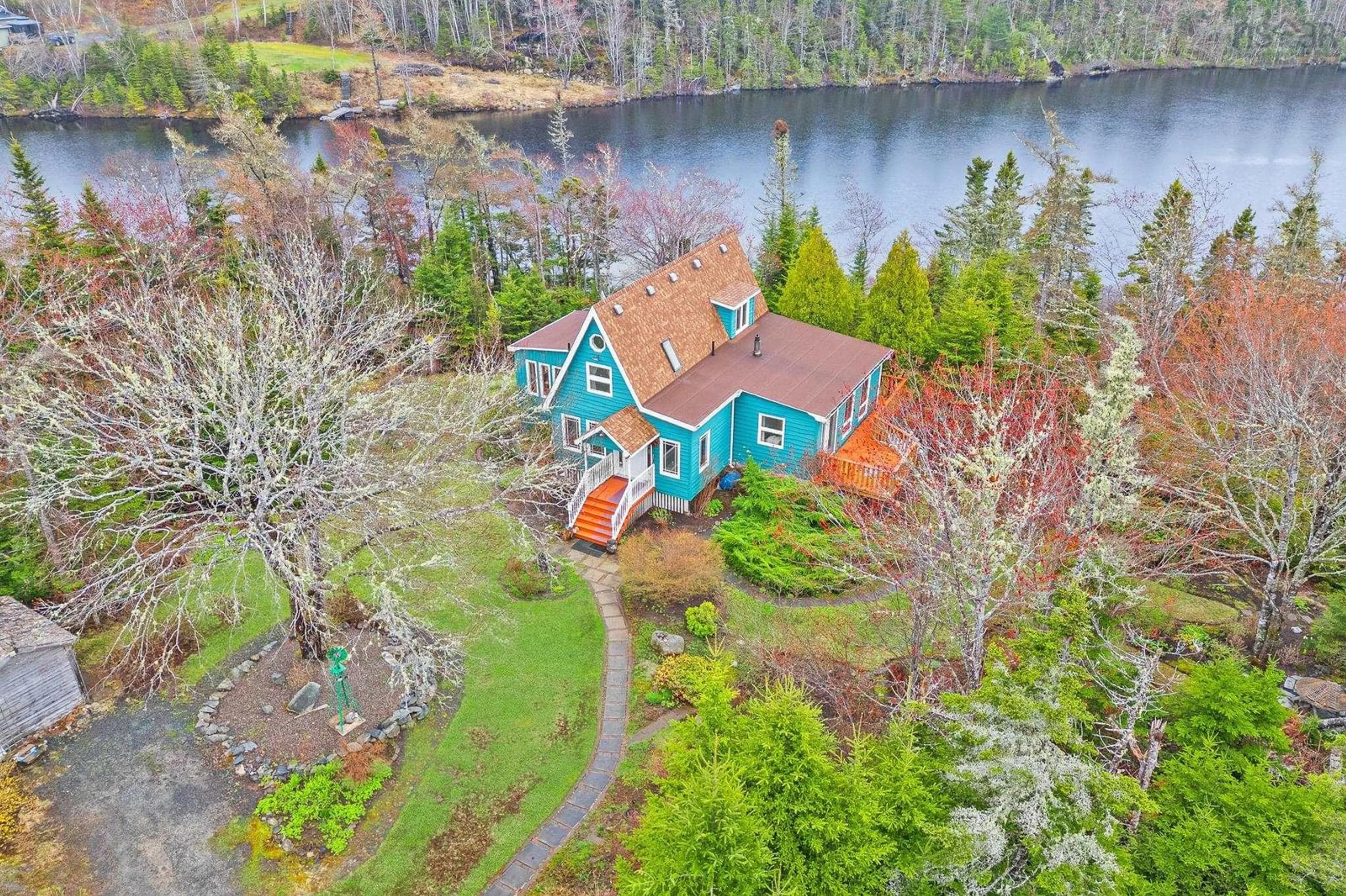 A pic from outside/outdoor area/front of a property/back of a property/a pic from drone, water/lake/river/ocean view for 11028 Highway 7, Lake Charlotte Nova Scotia B0J 2L0