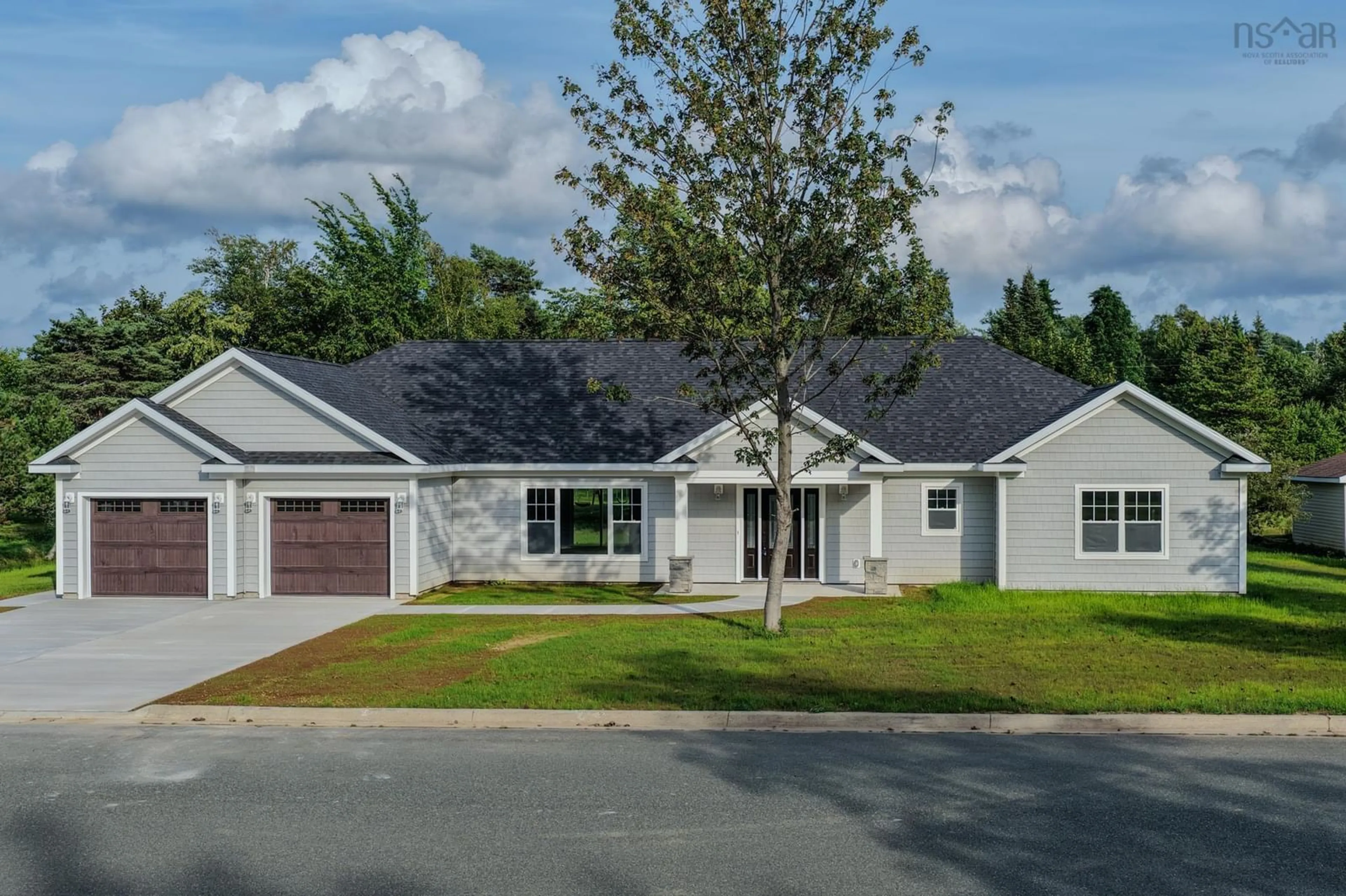 Home with vinyl exterior material, street for 18 Ethan St, Sydney River Nova Scotia B1S 0G7