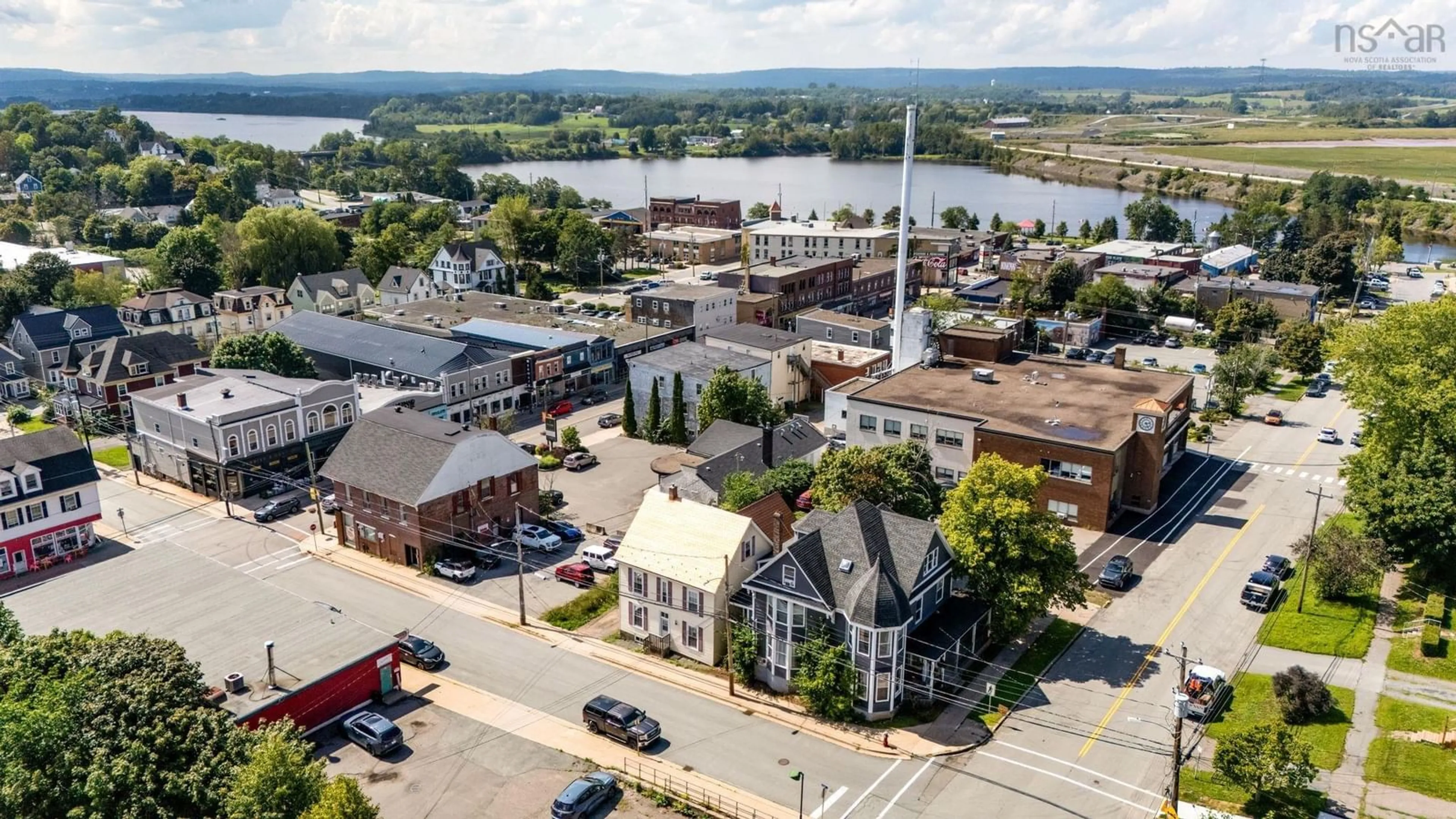 A pic from outside/outdoor area/front of a property/back of a property/a pic from drone, water/lake/river/ocean view for 20 Gray St, Windsor Nova Scotia B0N 2T0