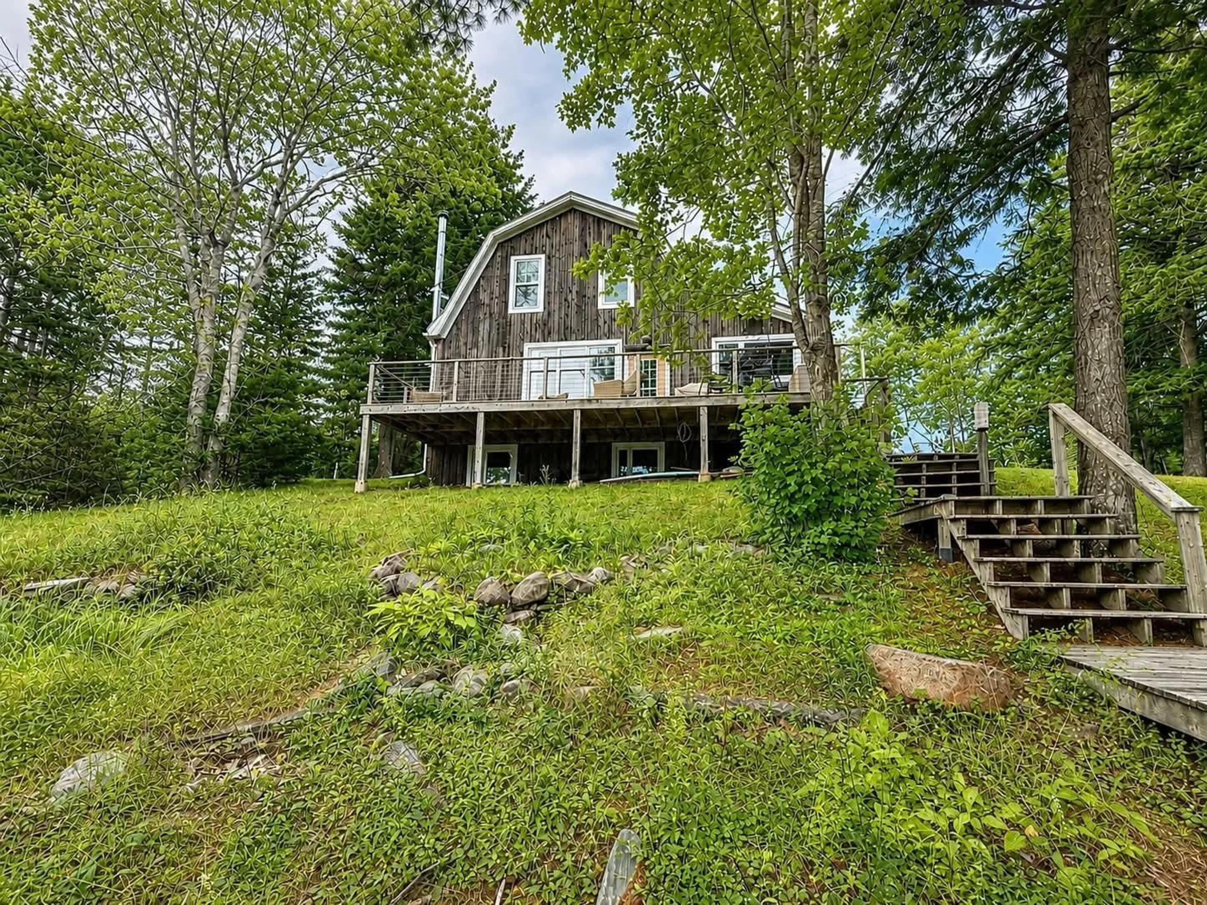 A pic from outside/outdoor area/front of a property/back of a property/a pic from drone, water/lake/river/ocean view for 132 Boyce Rd, Mattatall Lake Nova Scotia B0M 1Z0