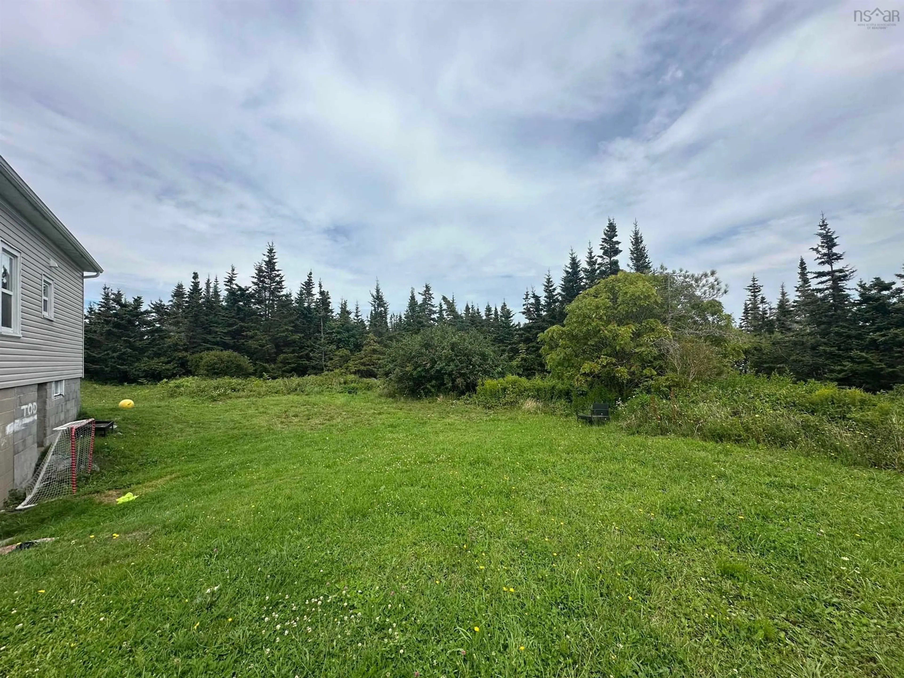 A pic from outside/outdoor area/front of a property/back of a property/a pic from drone, forest/trees view for 373 Bear Point Rd, Bear Point Nova Scotia B0W 3B0