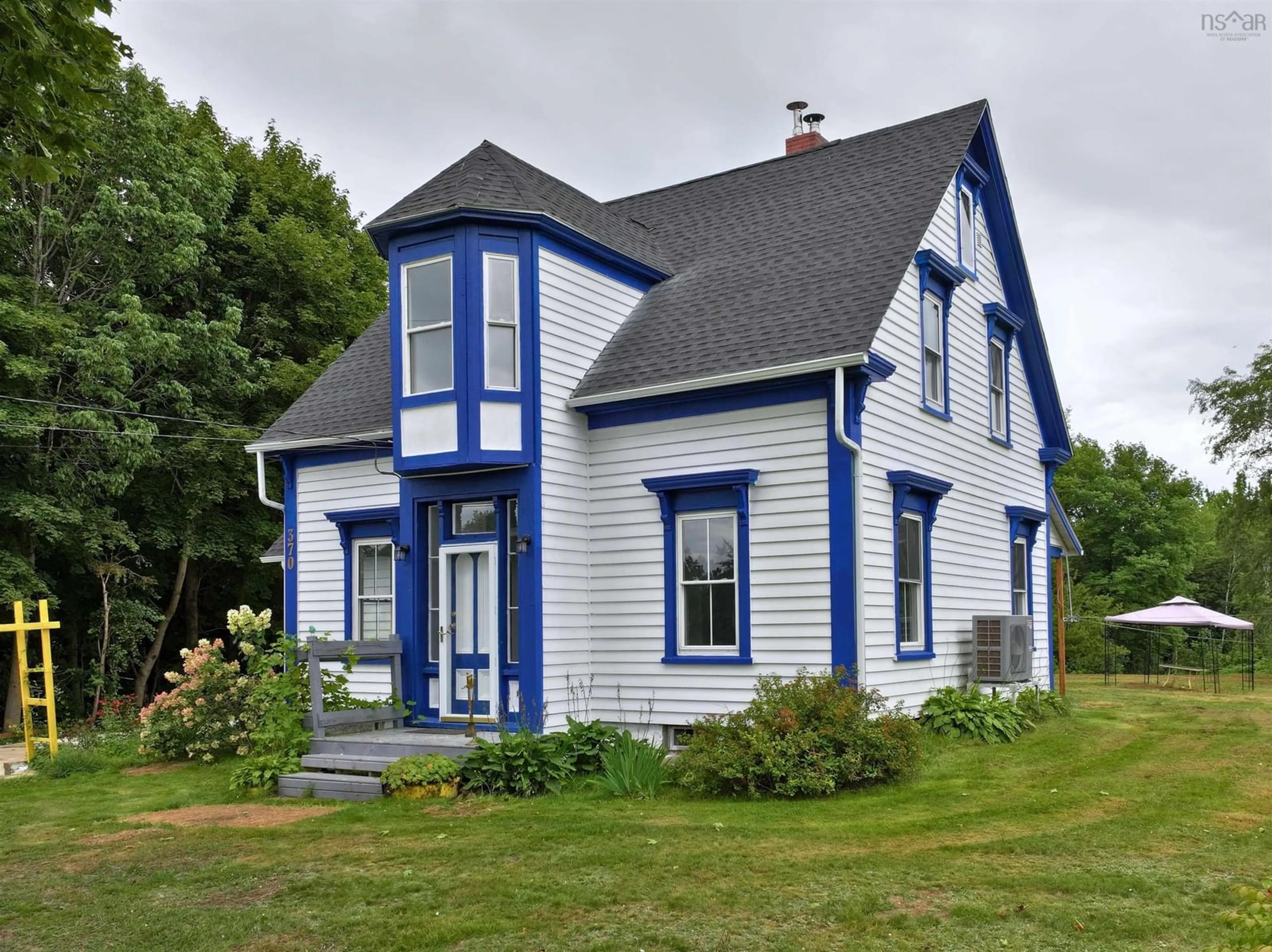 Home with vinyl exterior material, street for 370 Back Centre Rd, Back Centre Nova Scotia B0J 2C0