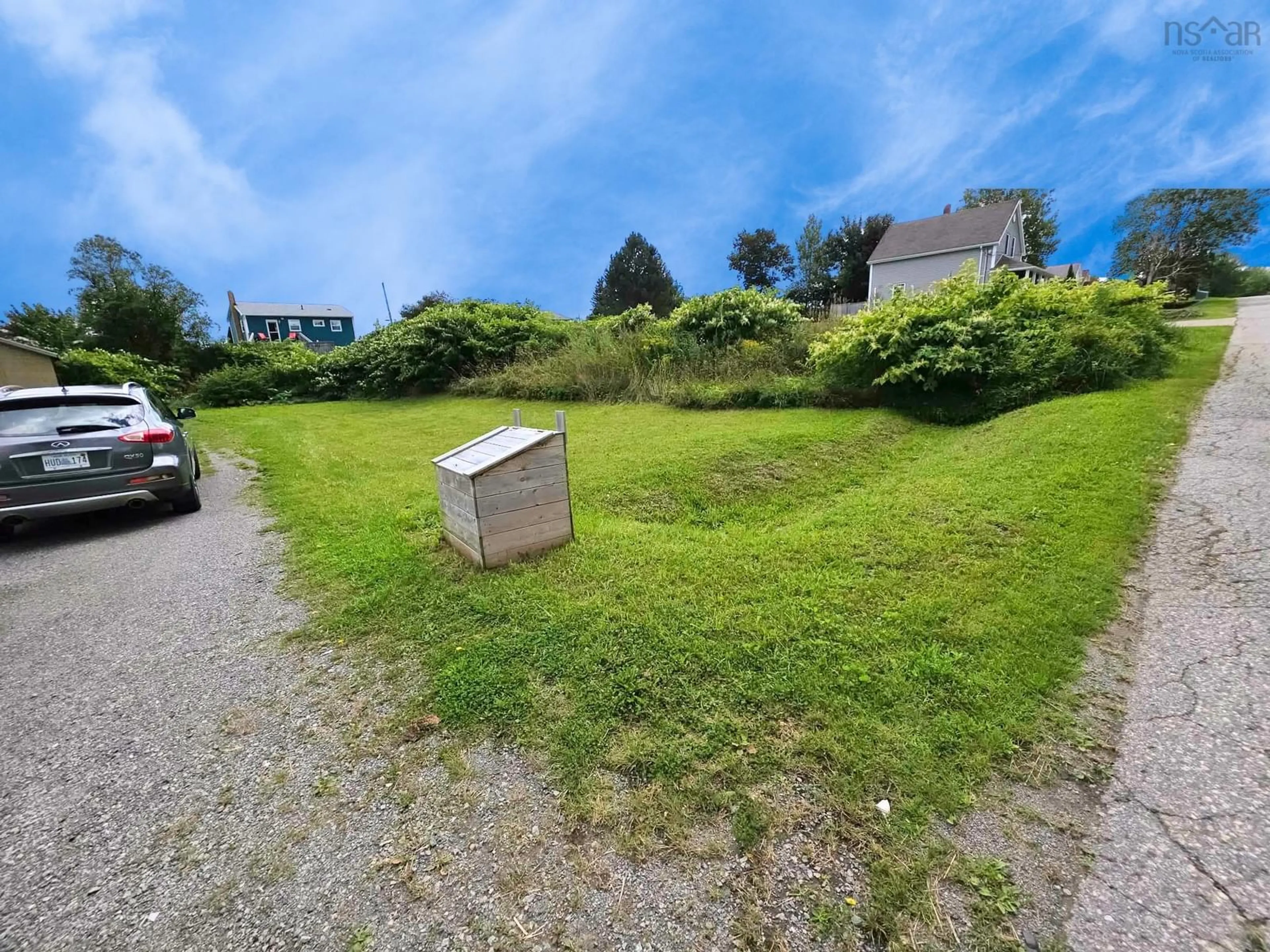 A pic from outside/outdoor area/front of a property/back of a property/a pic from drone, street for 135 Monteith Ave, Westmount Nova Scotia B1R 1K9