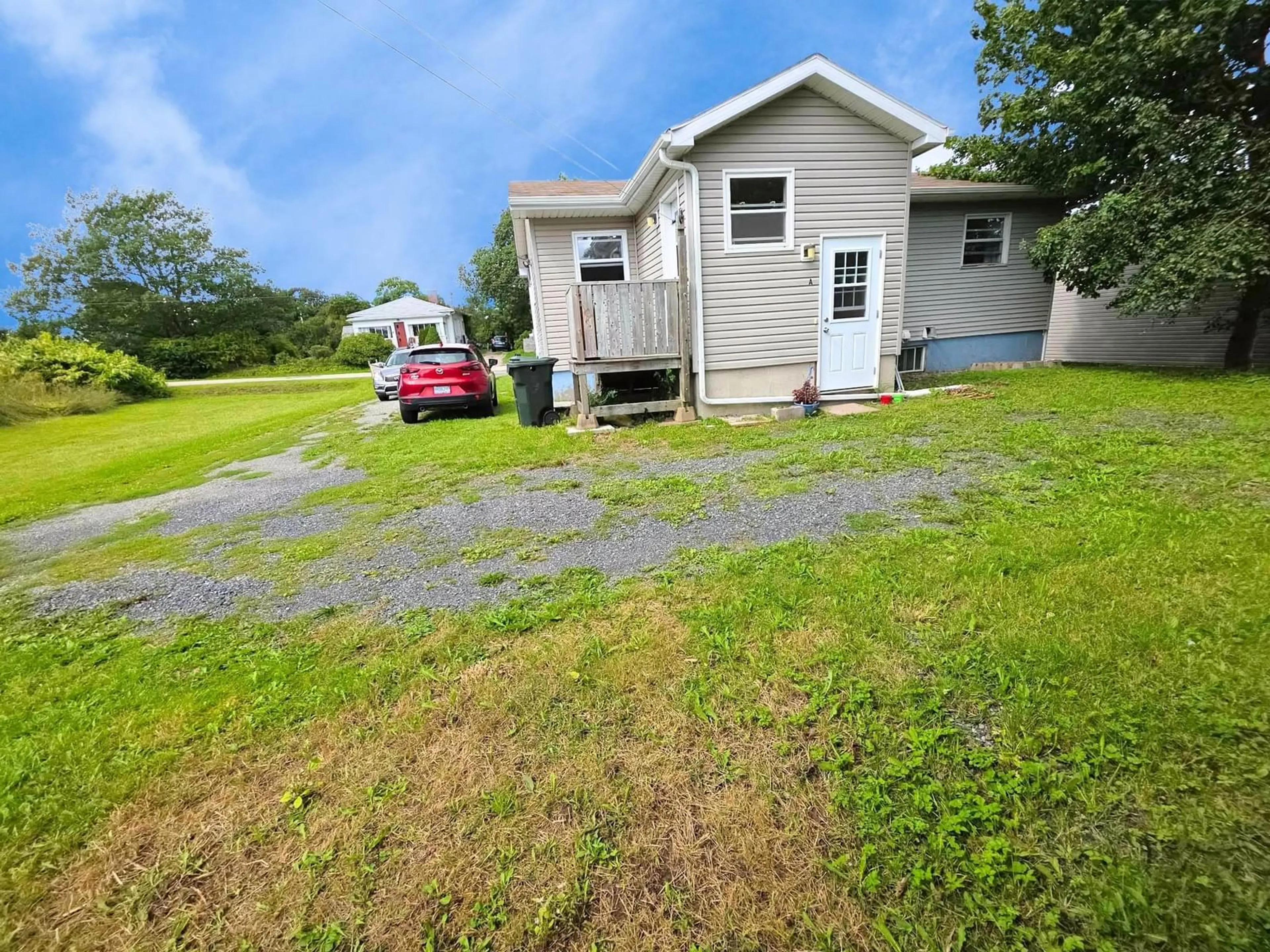 A pic from outside/outdoor area/front of a property/back of a property/a pic from drone, unknown for 135 Monteith Ave, Westmount Nova Scotia B1R 1K9