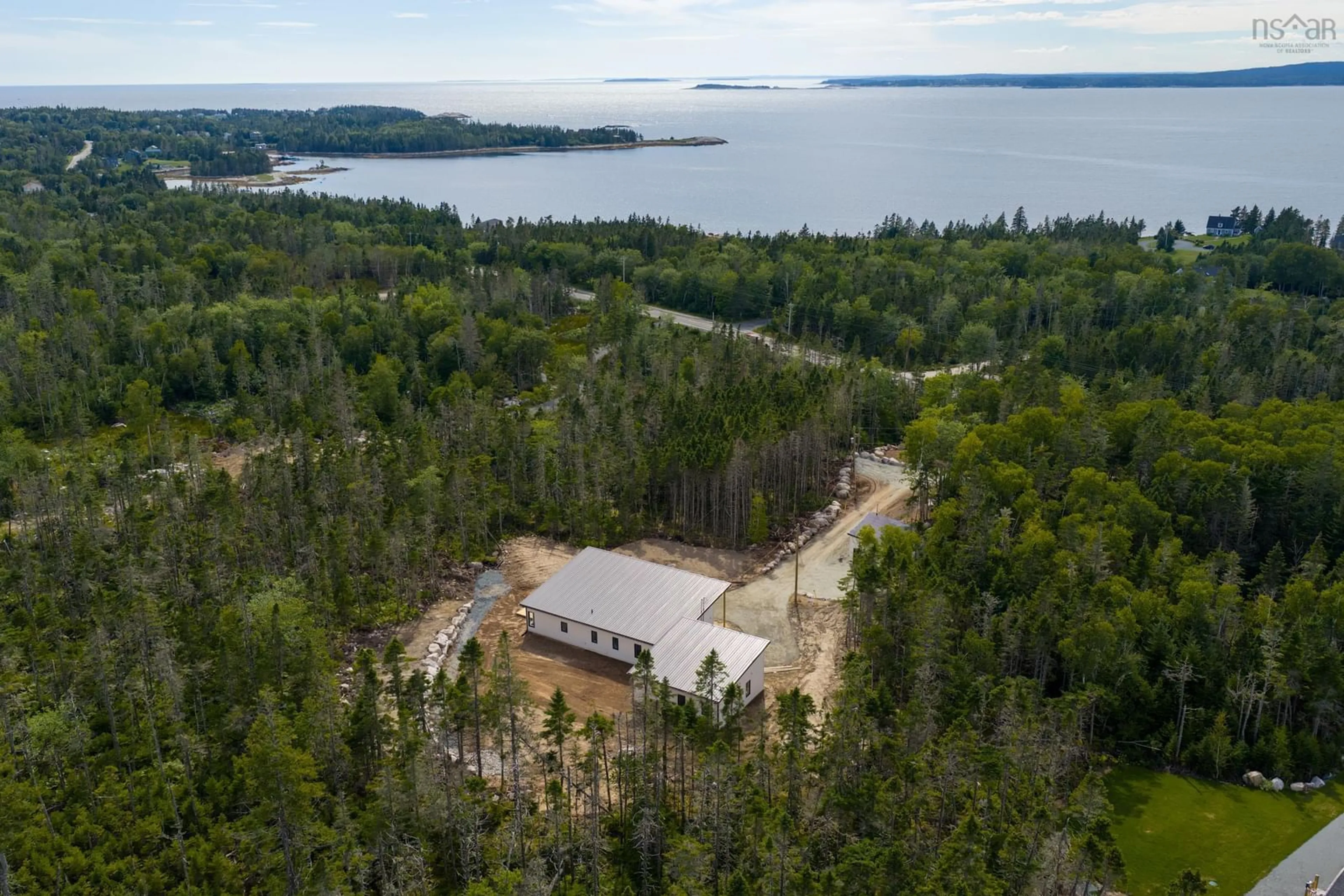 A pic from outside/outdoor area/front of a property/back of a property/a pic from drone, water/lake/river/ocean view for 9241 Peggys Cove Rd, Hacketts Cove Nova Scotia B3Z 0T7