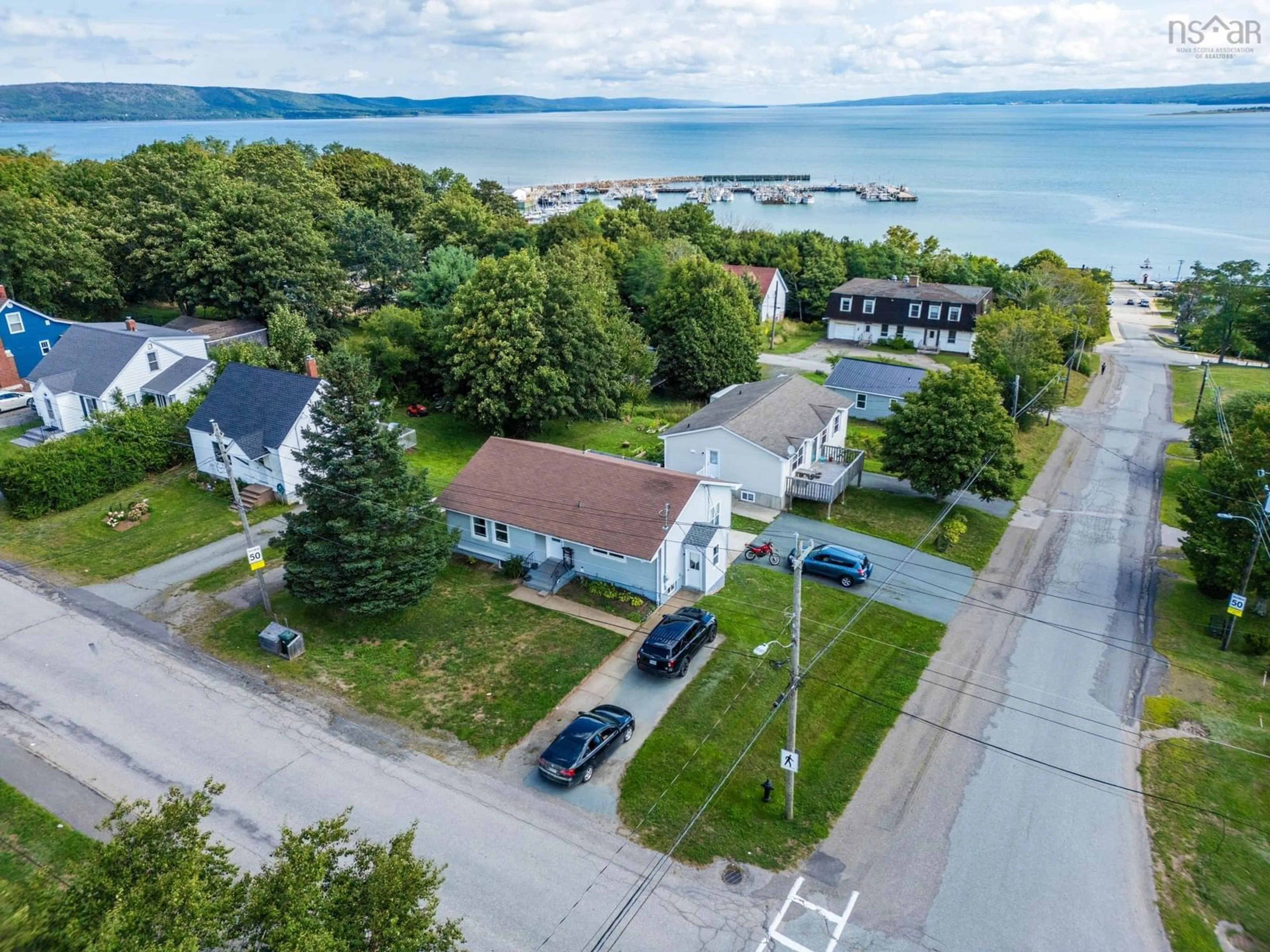 A pic from outside/outdoor area/front of a property/back of a property/a pic from drone, water/lake/river/ocean view for 126 King Street, Digby Nova Scotia B0V 1A0