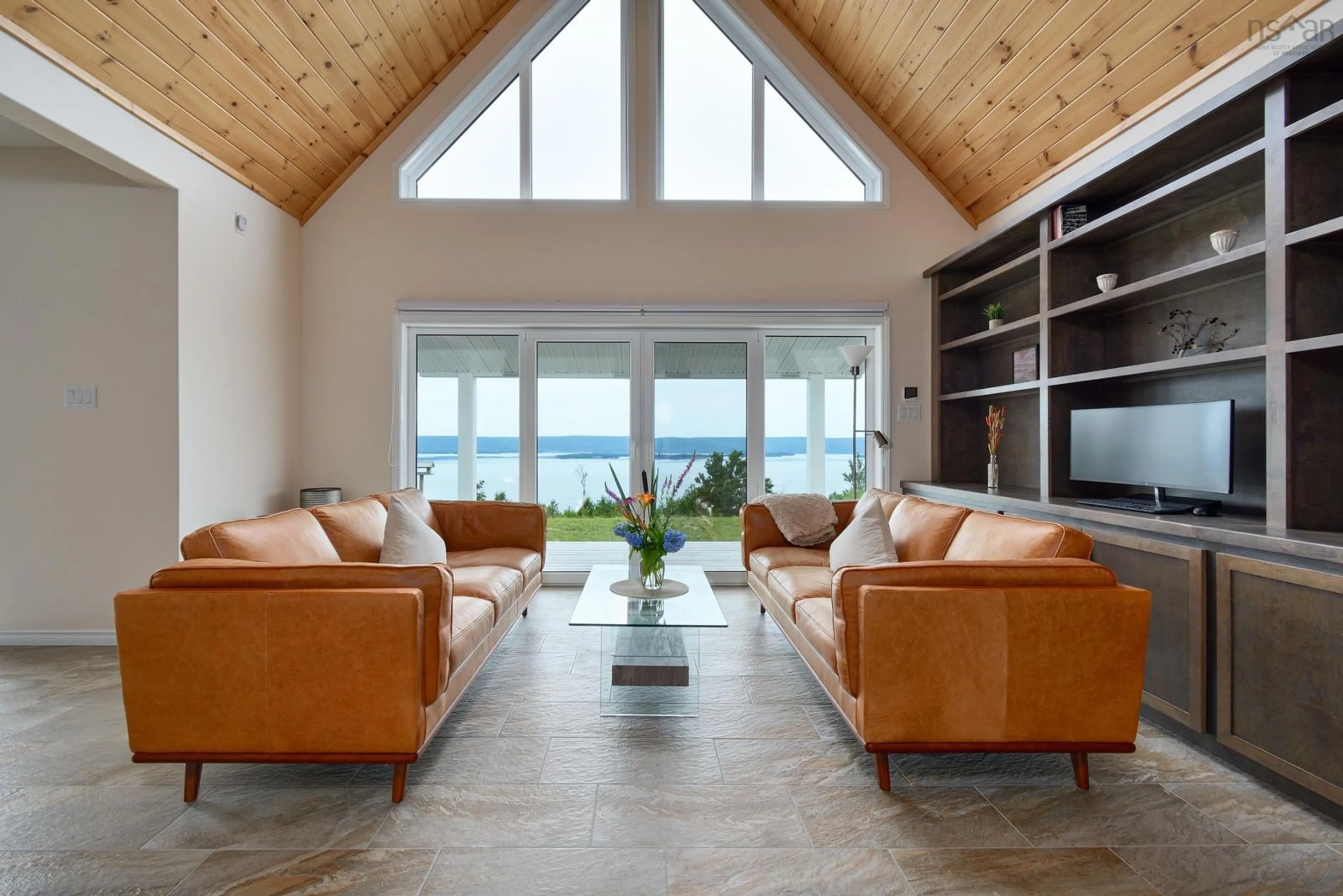 Living room with furniture, unknown for 11 and 23 Golden View Drive, St George's Channel Nova Scotia B0E 3K0
