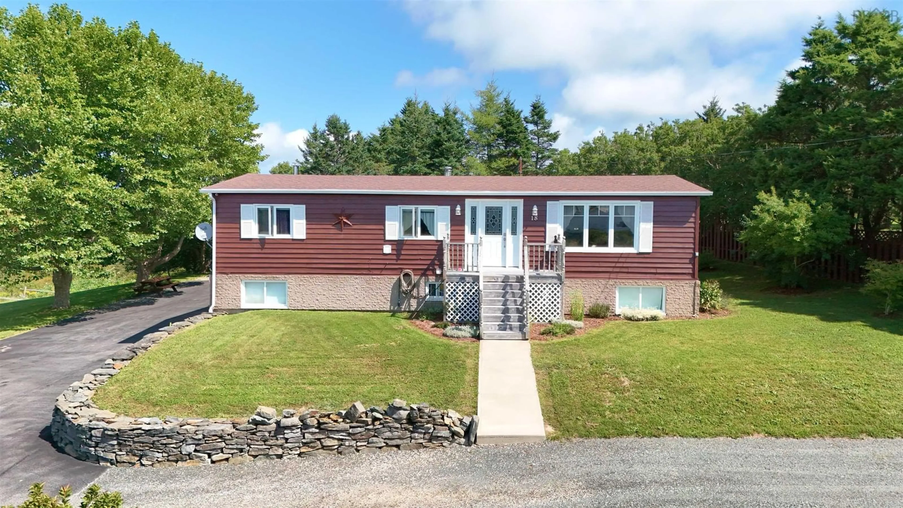 Home with vinyl exterior material, street for 18 Cemetery Rd, Hebron Nova Scotia B5A 4K4