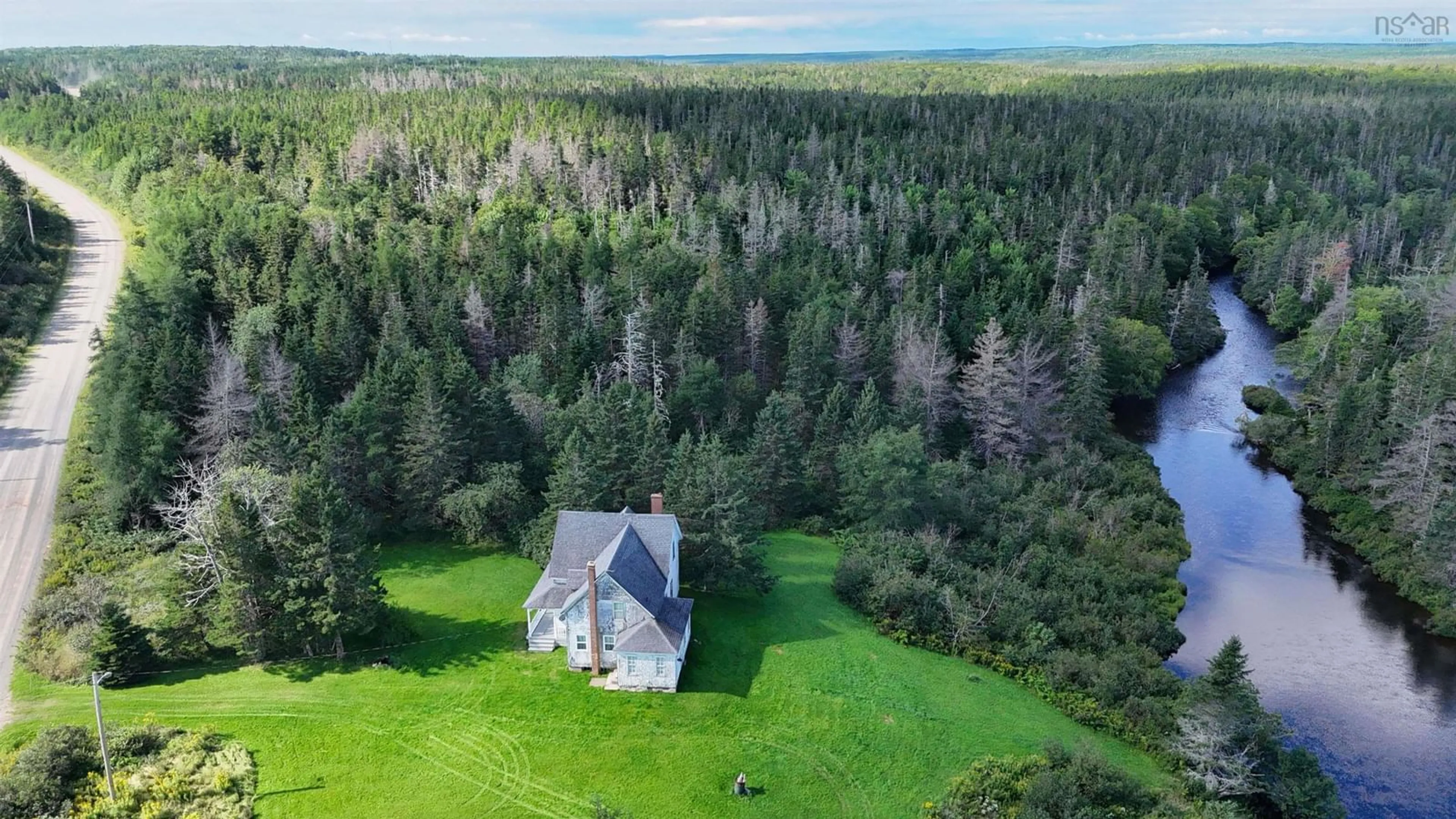 A pic from outside/outdoor area/front of a property/back of a property/a pic from drone, forest/trees view for 2121 Loch Lomond Rd, Loch Lomond Nova Scotia B2E 1E3