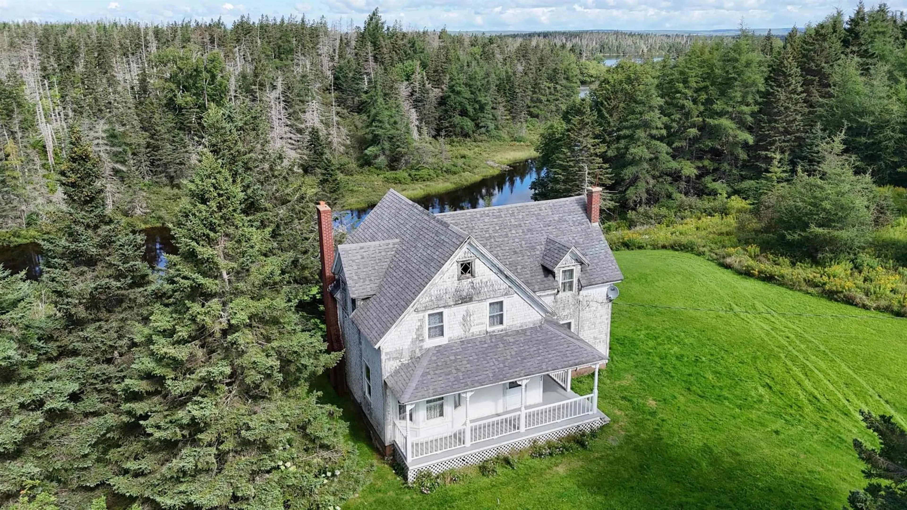 A pic from outside/outdoor area/front of a property/back of a property/a pic from drone, water/lake/river/ocean view for 2121 Loch Lomond Rd, Loch Lomond Nova Scotia B2E 1E3