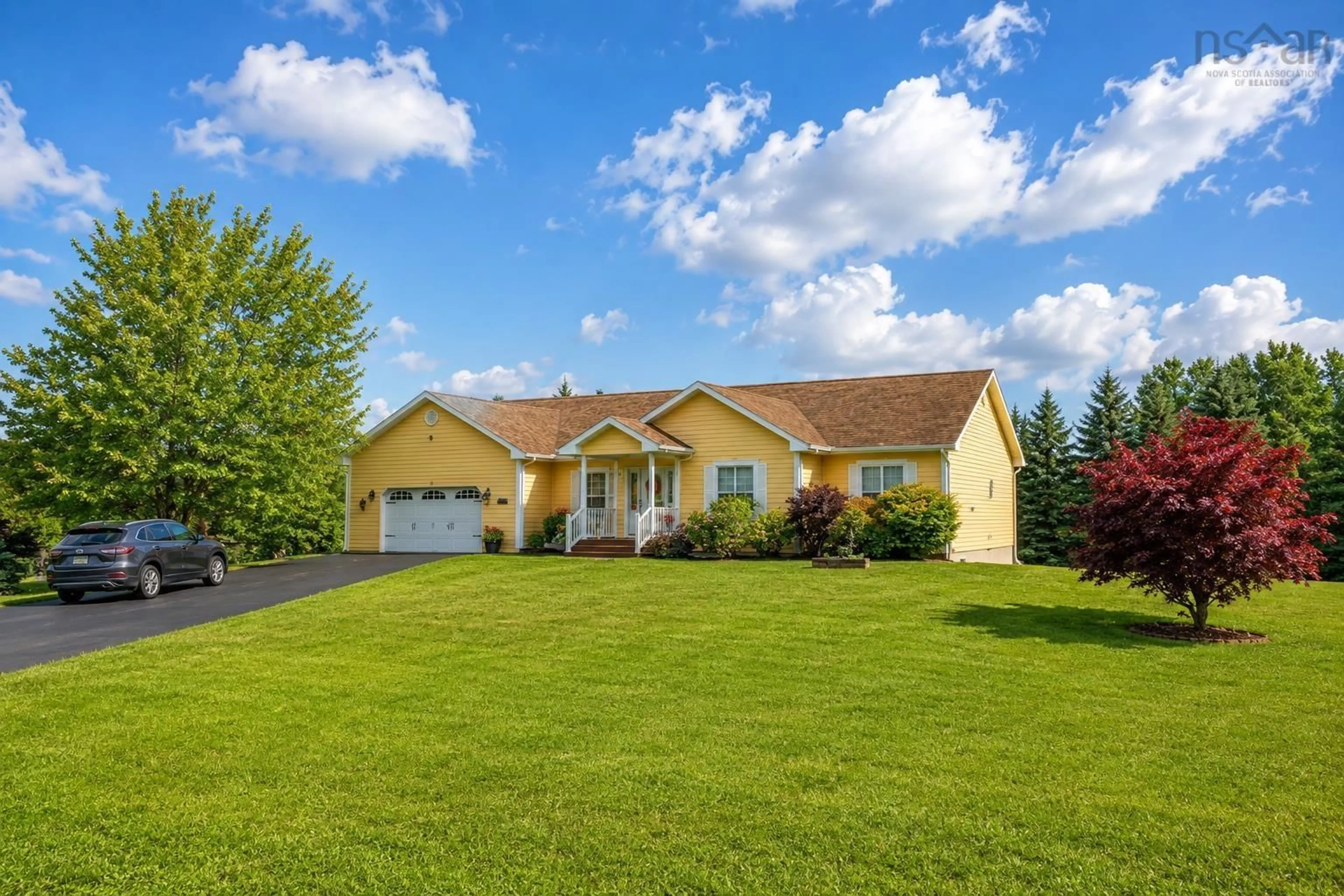 A pic from outside/outdoor area/front of a property/back of a property/a pic from drone, street for 15 Meadowood Crt, Sydney River Nova Scotia B1L 0A2