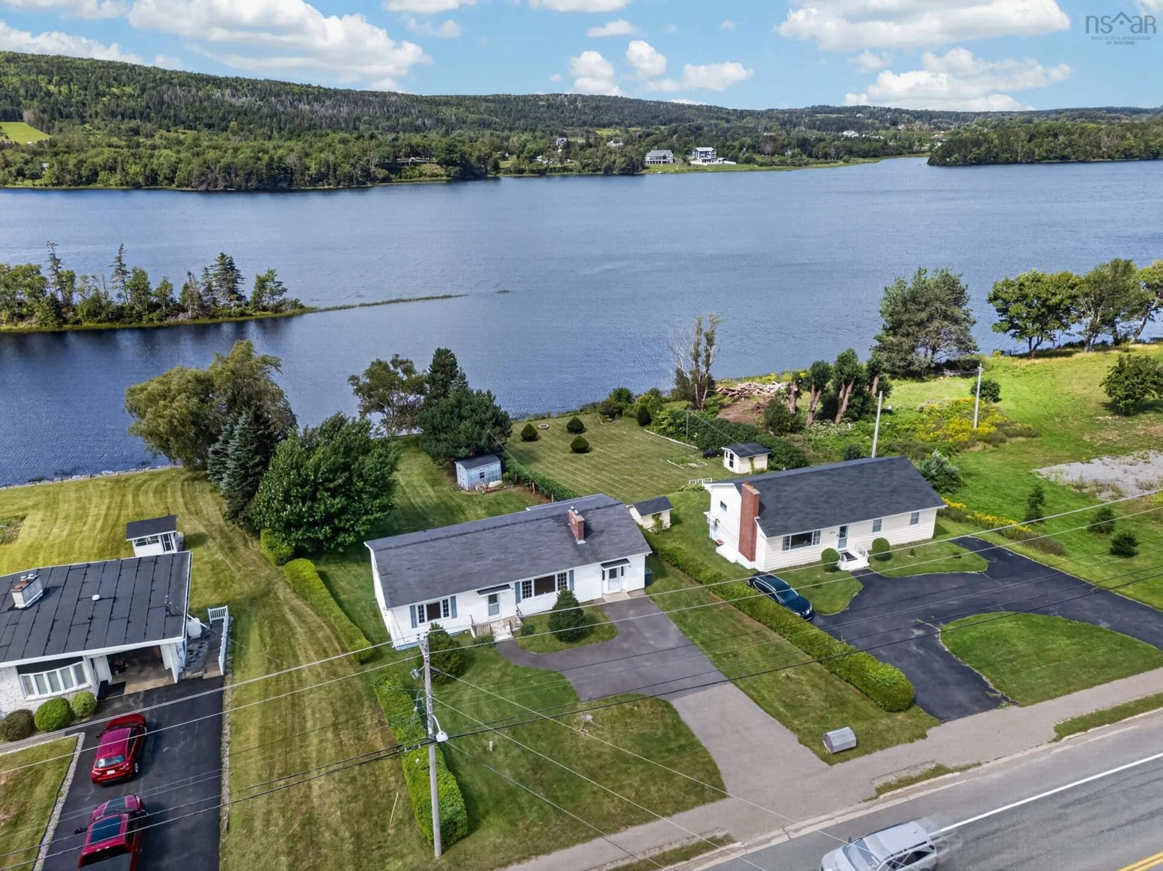 A pic from outside/outdoor area/front of a property/back of a property/a pic from drone, water/lake/river/ocean view for 2034 Kings Road, Howie Centre Nova Scotia B1L 1C4