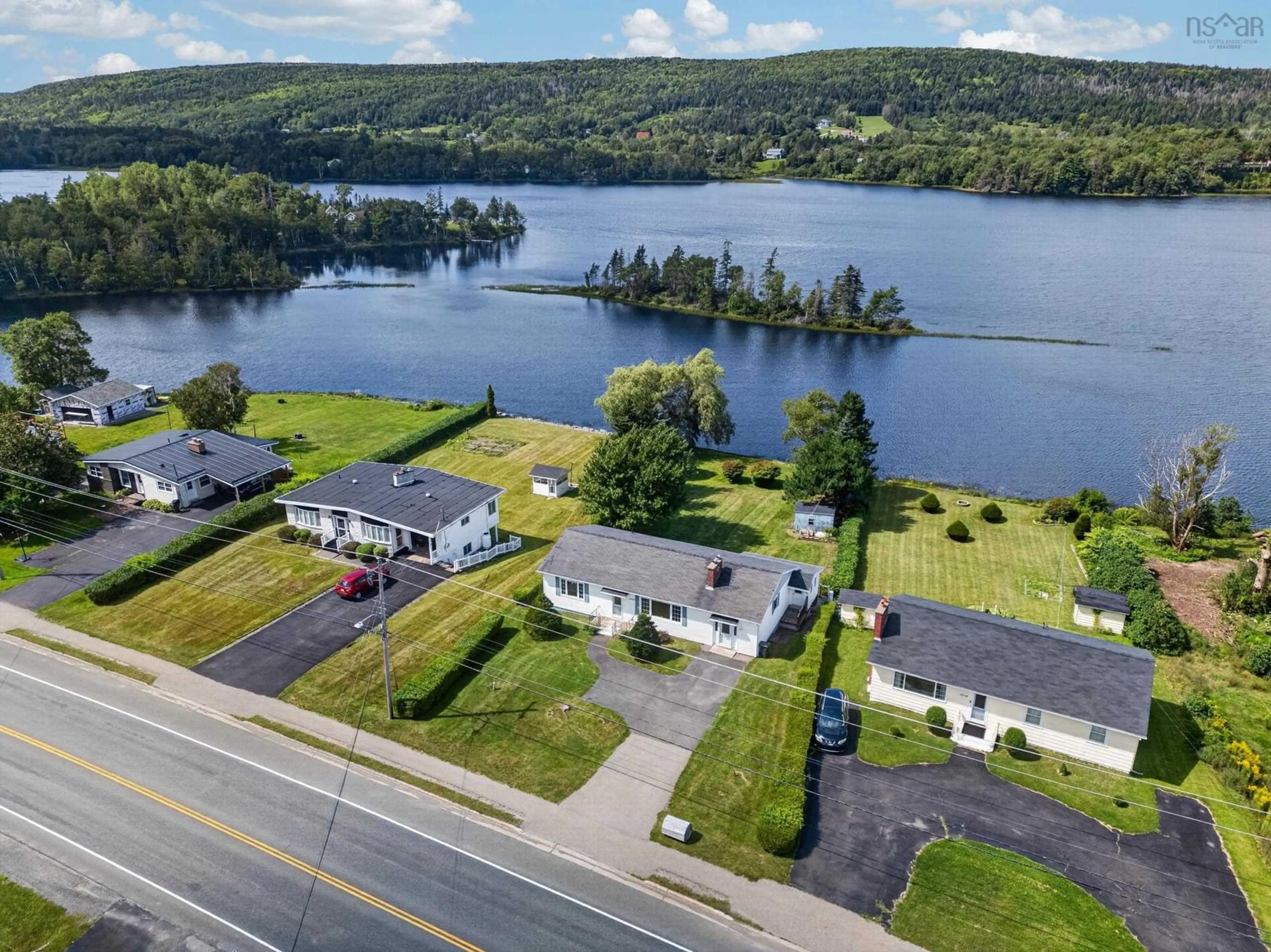 A pic from outside/outdoor area/front of a property/back of a property/a pic from drone, water/lake/river/ocean view for 2034 Kings Road, Howie Centre Nova Scotia B1L 1C4